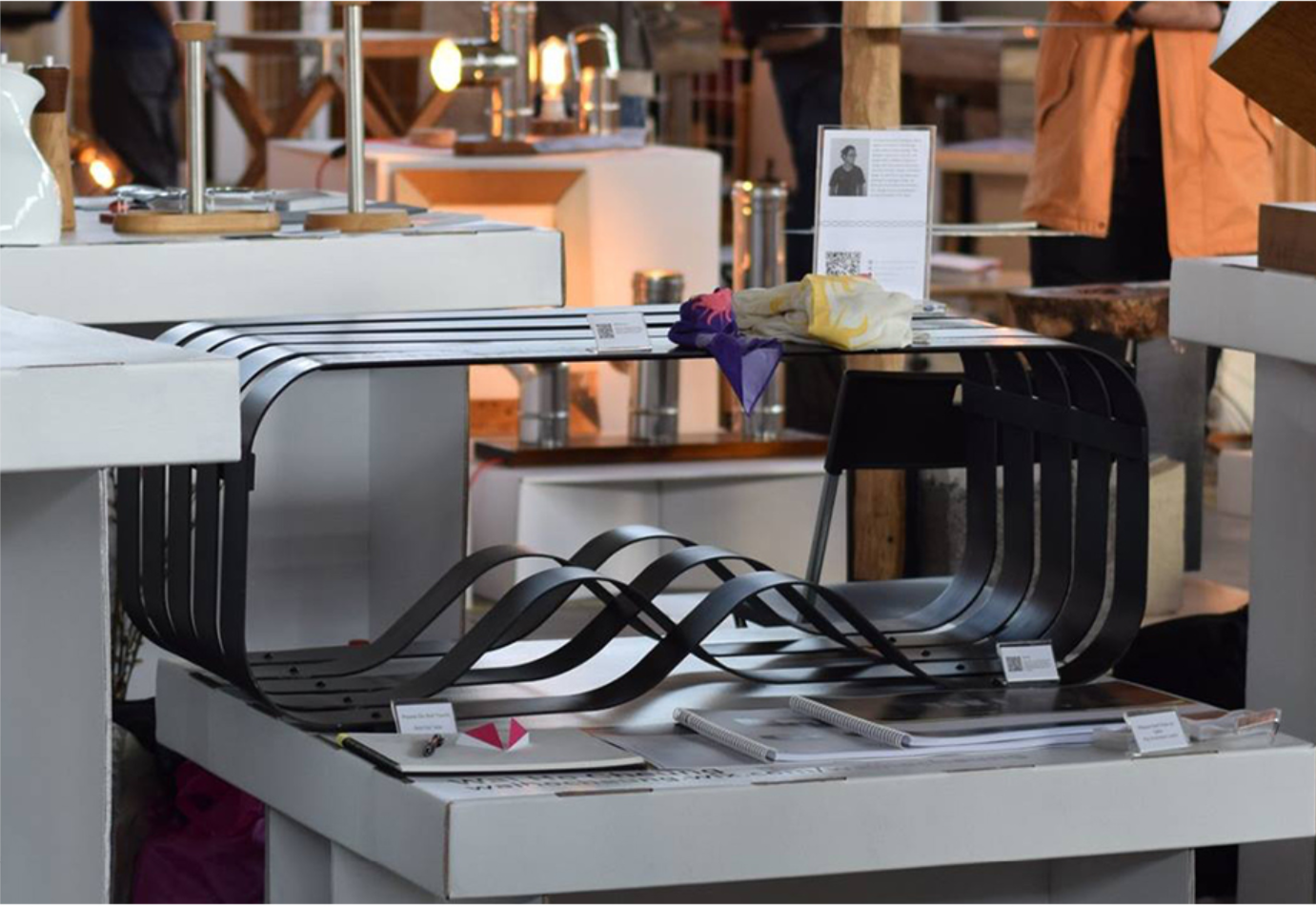 Arctic Coffee Table displayed as a sculptural centerpiece, where wave-like metal strips create the illusion of movement through light and shadow.