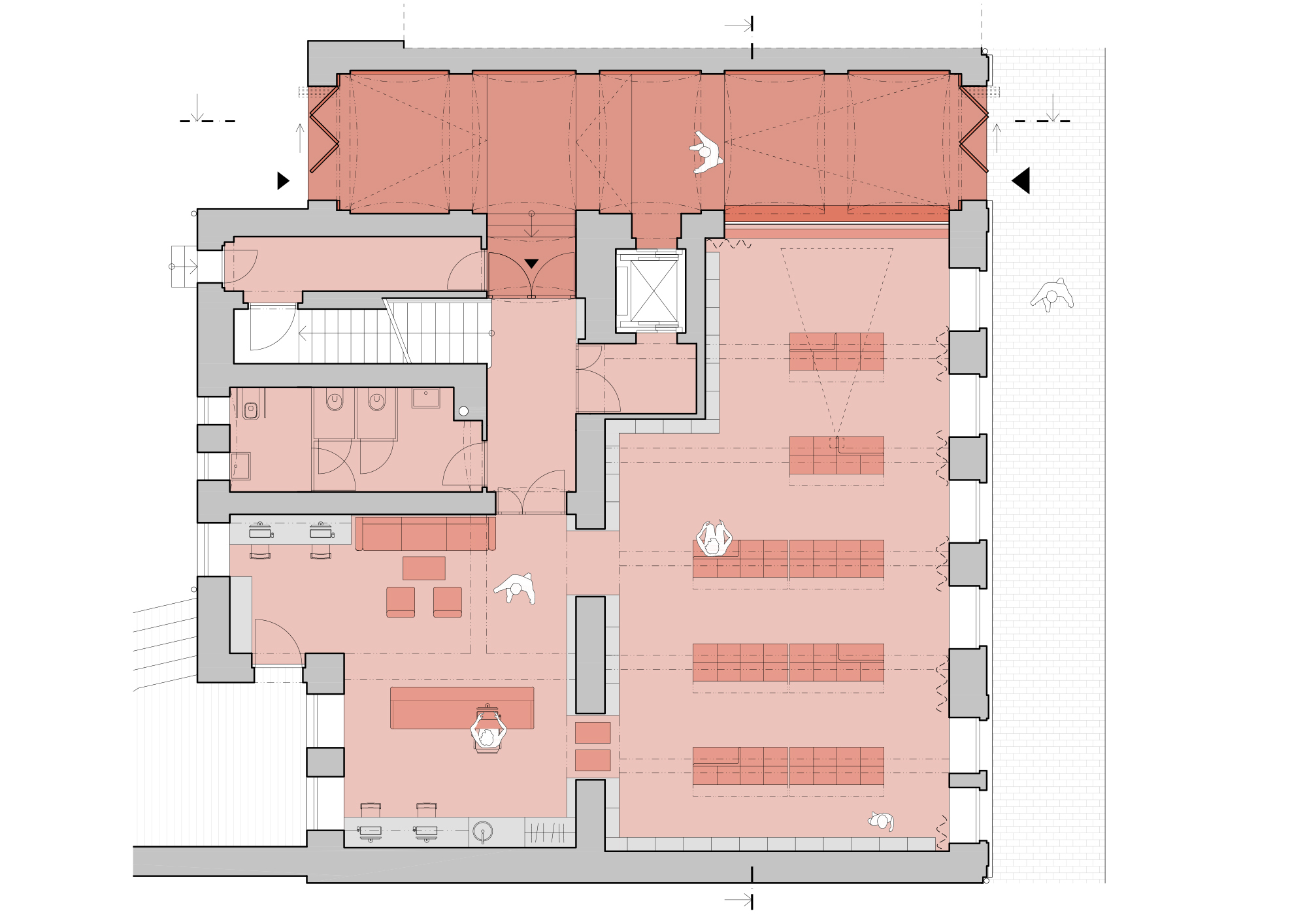 Floor plan drawing with spaces shaded in pink showing a gallery hall, staircase, and restroom facilities
