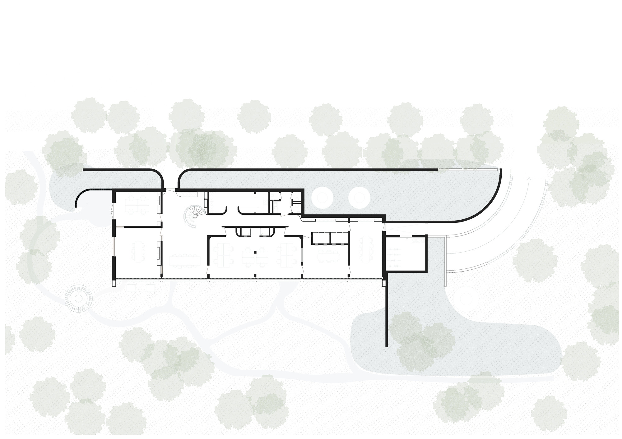 Floor plan drawing showing a linear volume with curved ends surrounded by tree canopies