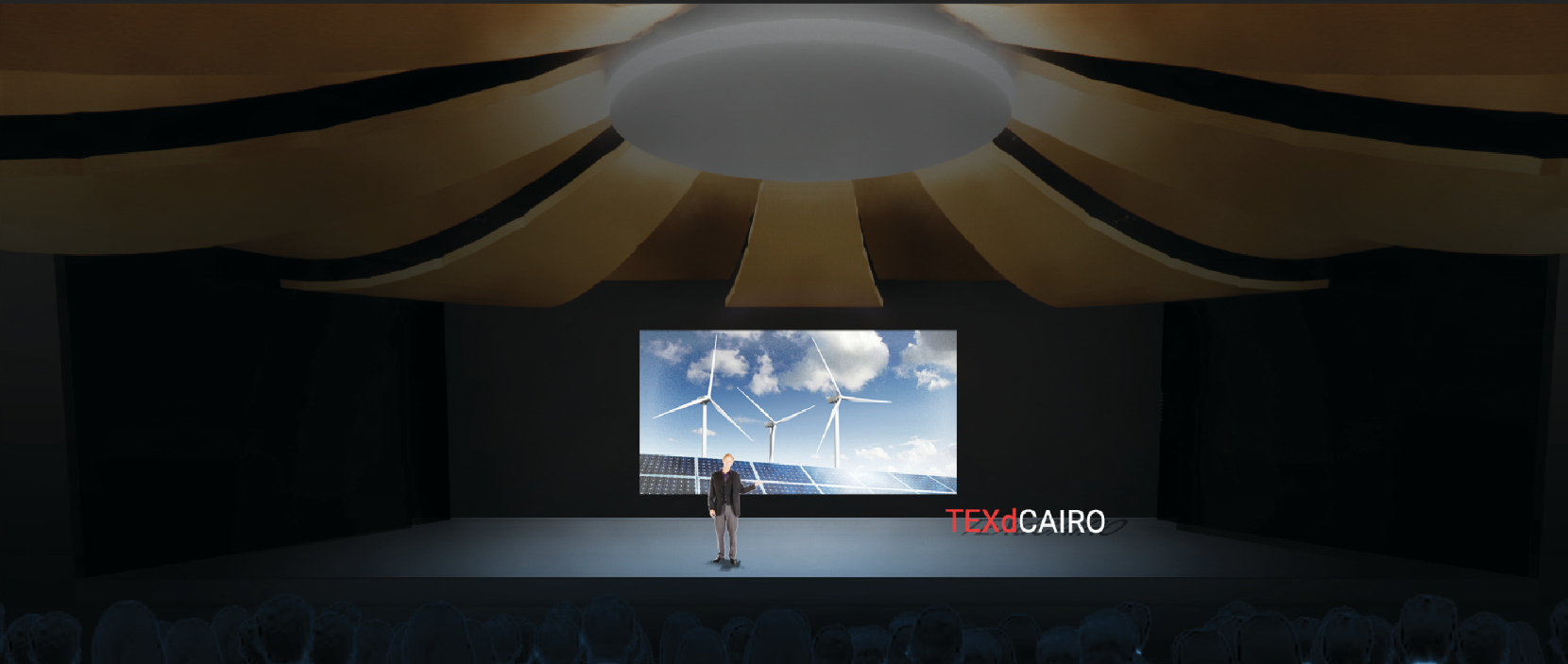 Auditorium stage hosting climate-focused presentations and talks