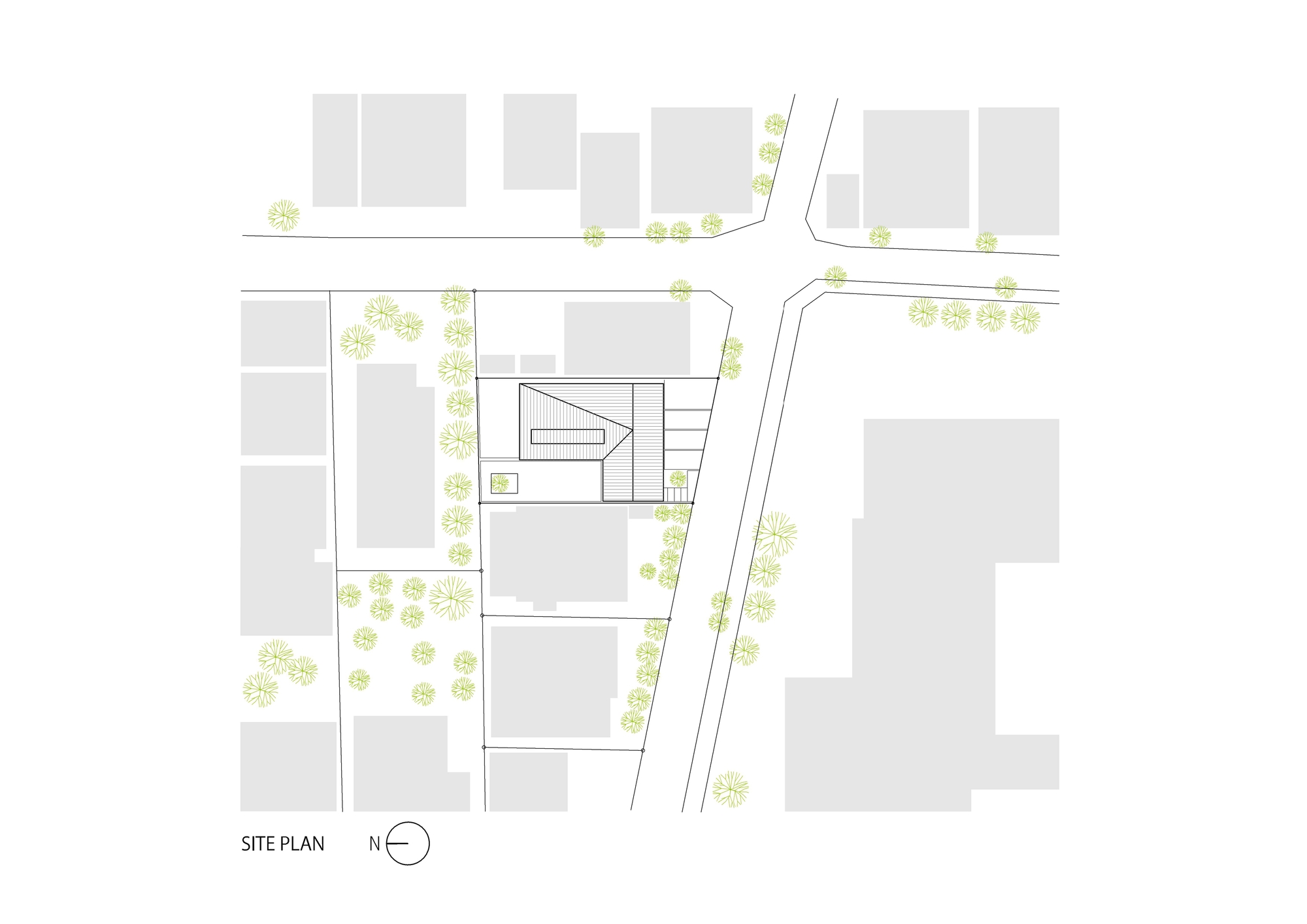 Site plan drawing showing the building footprint and surrounding street trees in the neighborhood context