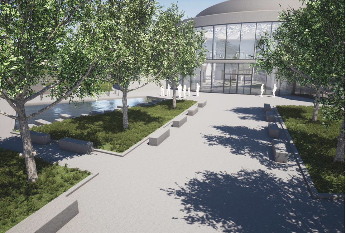 Public plaza and entrance landscape connecting community and school through open, accessible educational architecture.