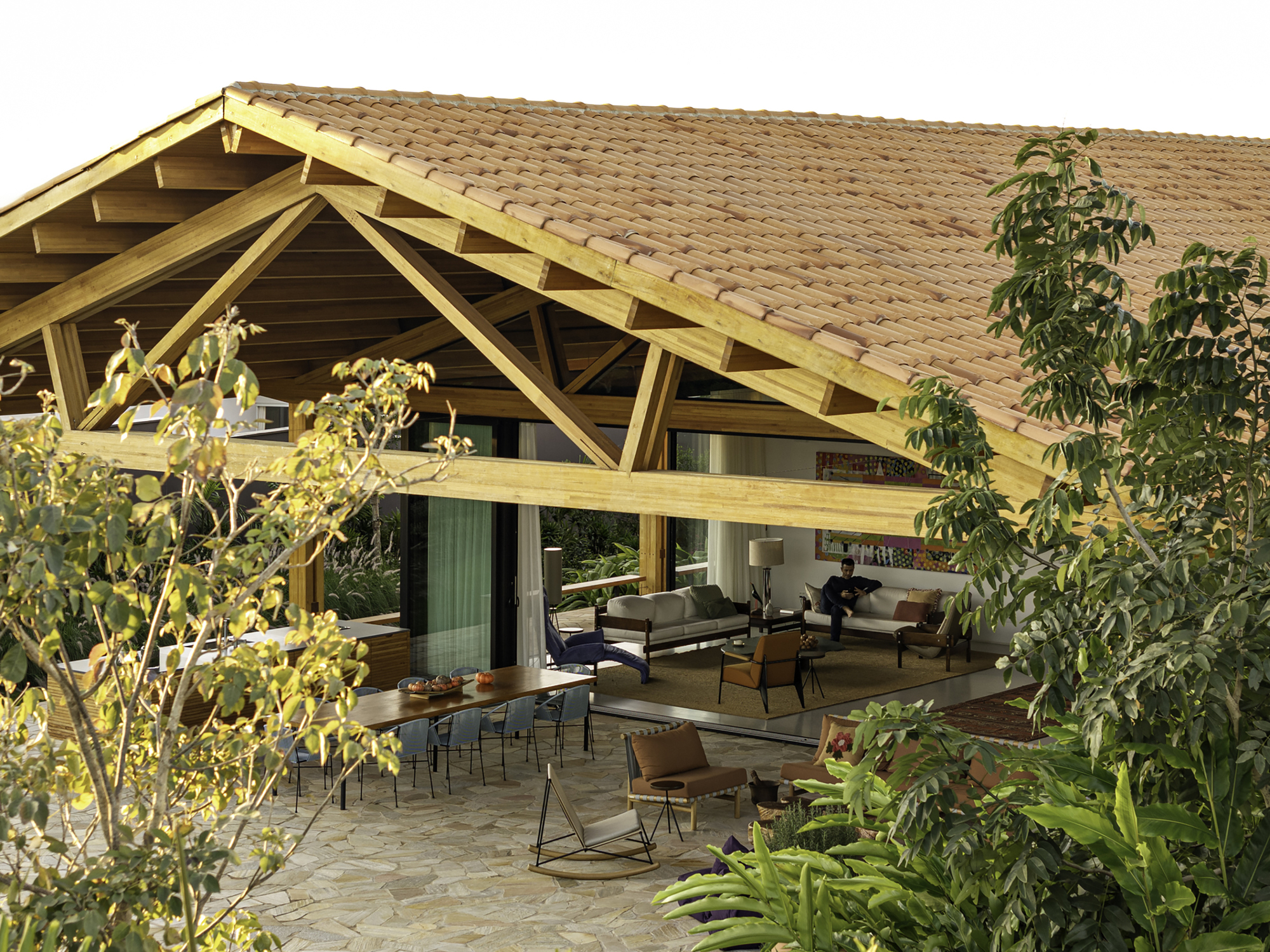 Open-air terrace under a clay tile roof with exposed timber trusses and tropical plantings
