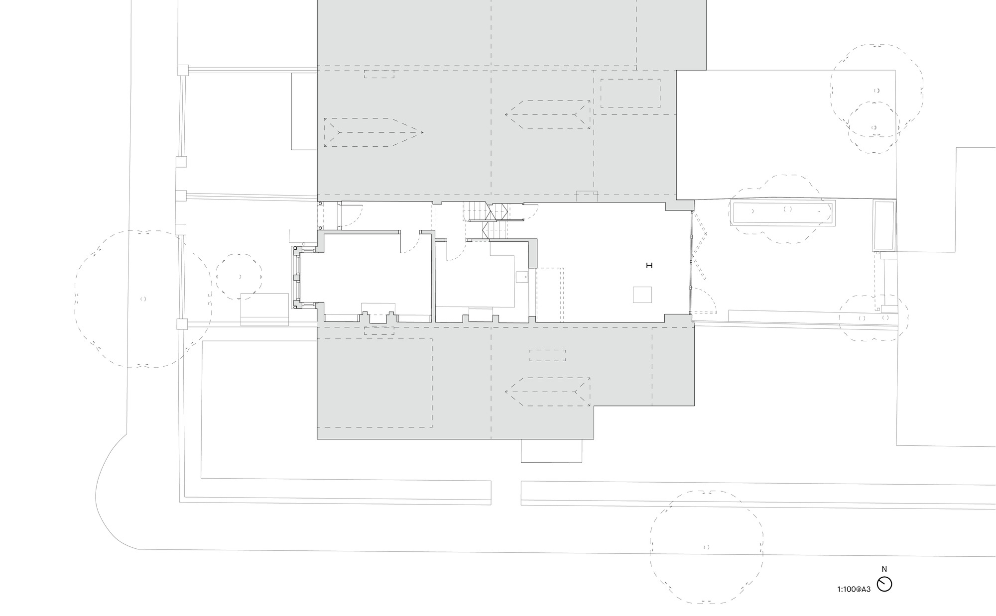 Floor plan drawing showing a central staircase with rooms and terraces arranged around it