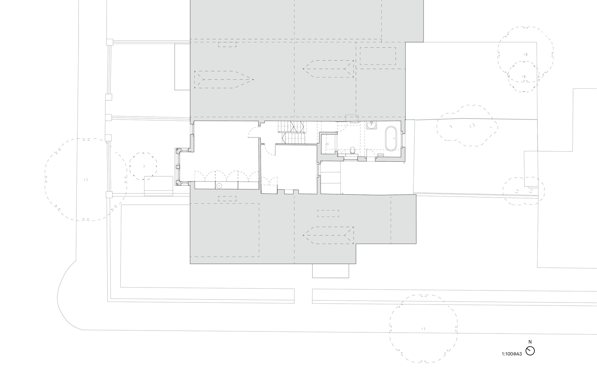 Floor plan drawing showing upper level with staircase, bathroom and bedroom layout