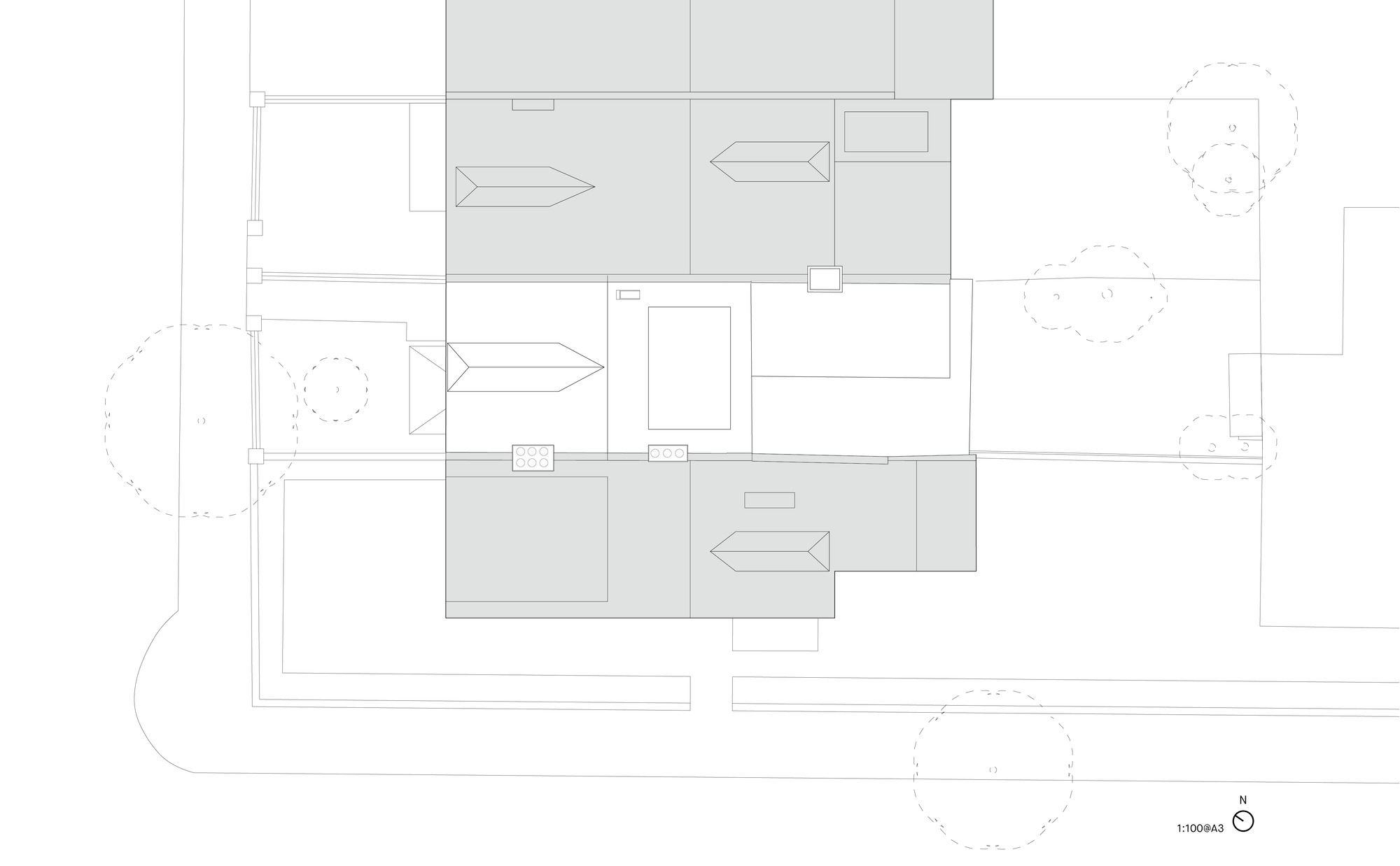 Roof plan drawing showing pitched roof volumes and directional arrows indicating slopes
