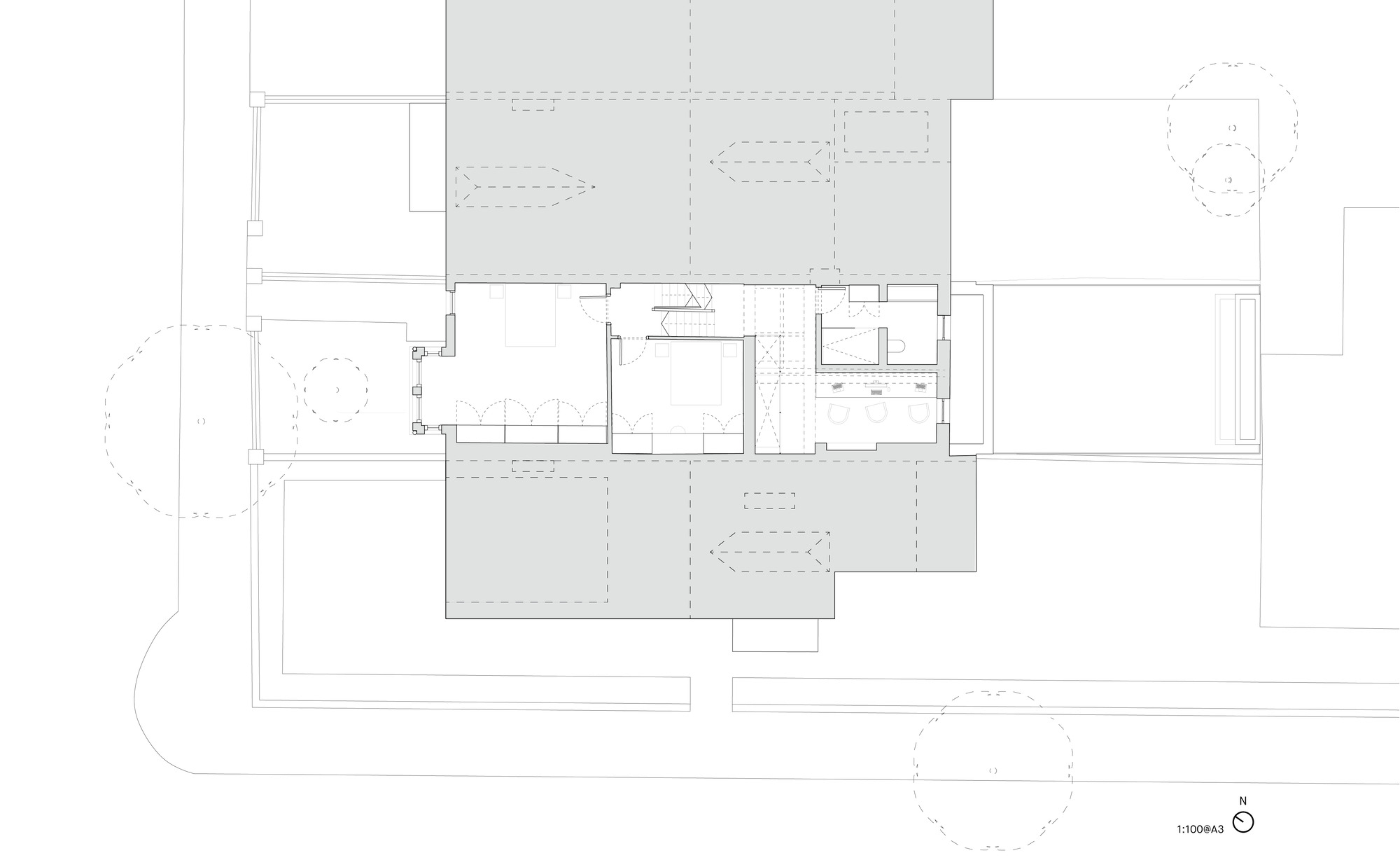 Floor plan drawing showing bedroom and bathroom volumes inserted within the central living zone