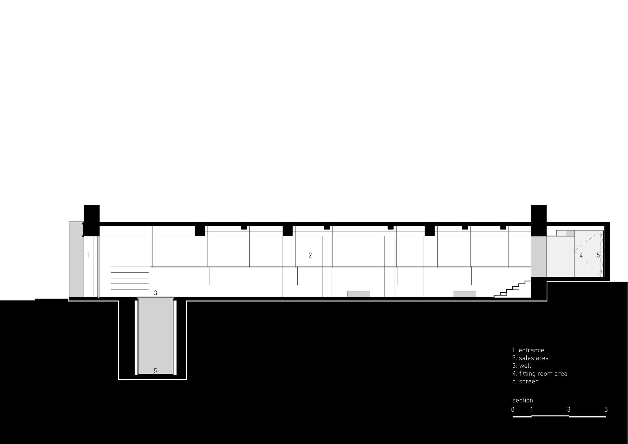 Section drawing revealing the split-level interior with sunken entrance and mezzanine storage above