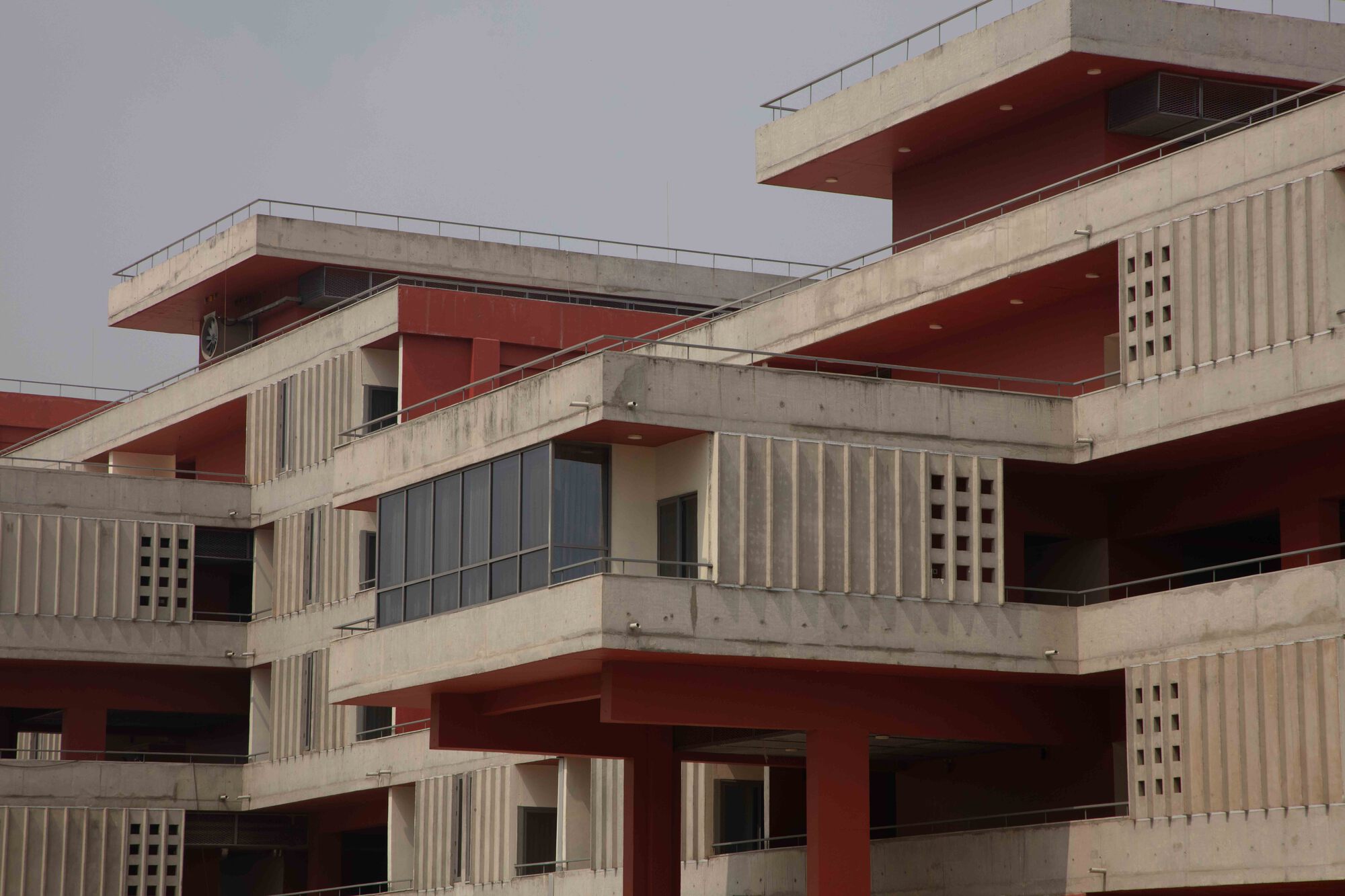 Detail of the stepped balconies and concrete brises-soleil on a corner of the building