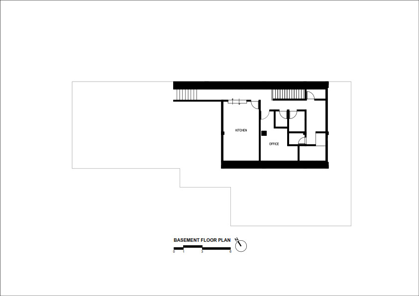 Basement floor plan drawing showing kitchen, office and service rooms with scale and north arrow