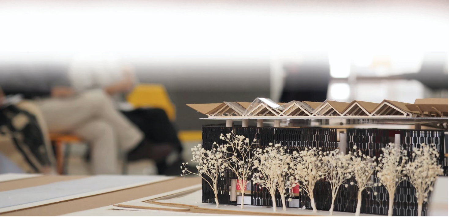 Physical model showcasing the layered façade and fragmented roof geometry of the Banned Book Library