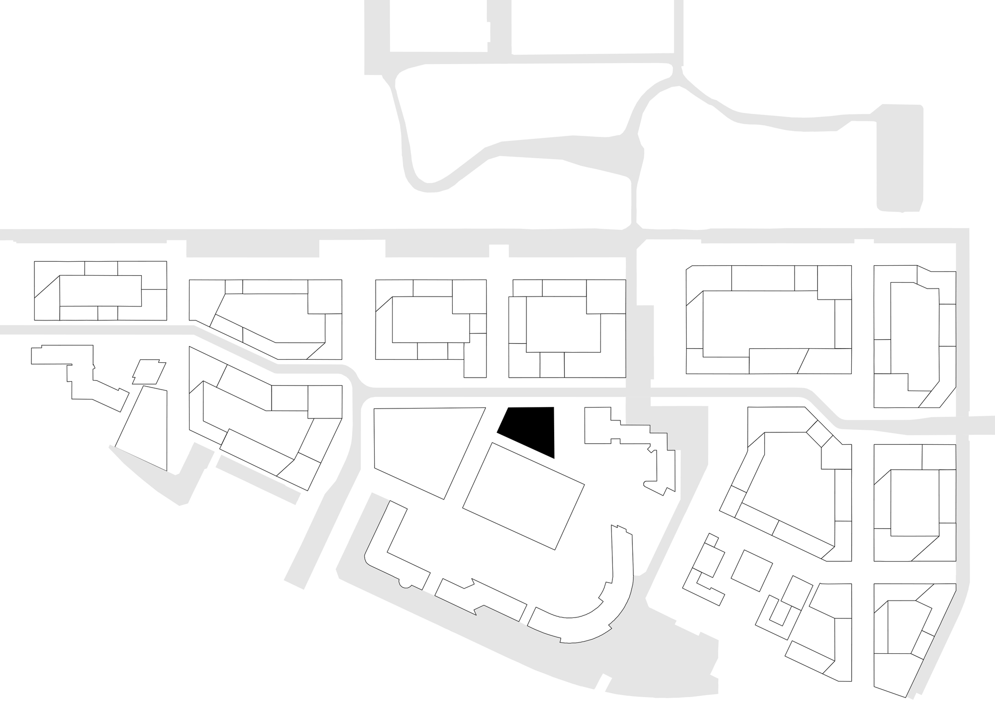Site plan drawing showing building footprint in black within surrounding urban block structure