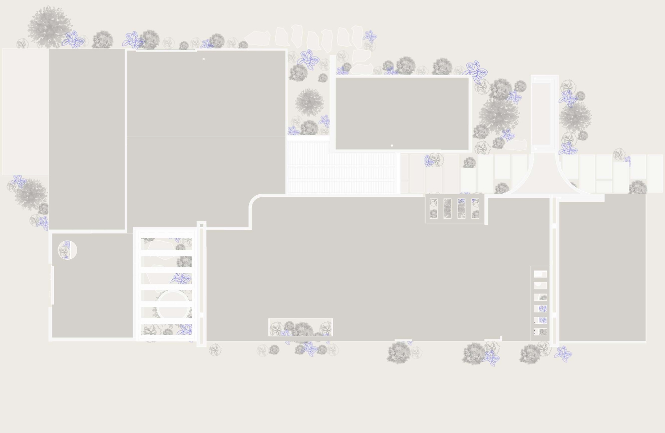 Site plan drawing showing rectangular building volumes surrounded by scattered trees and landscaped areas