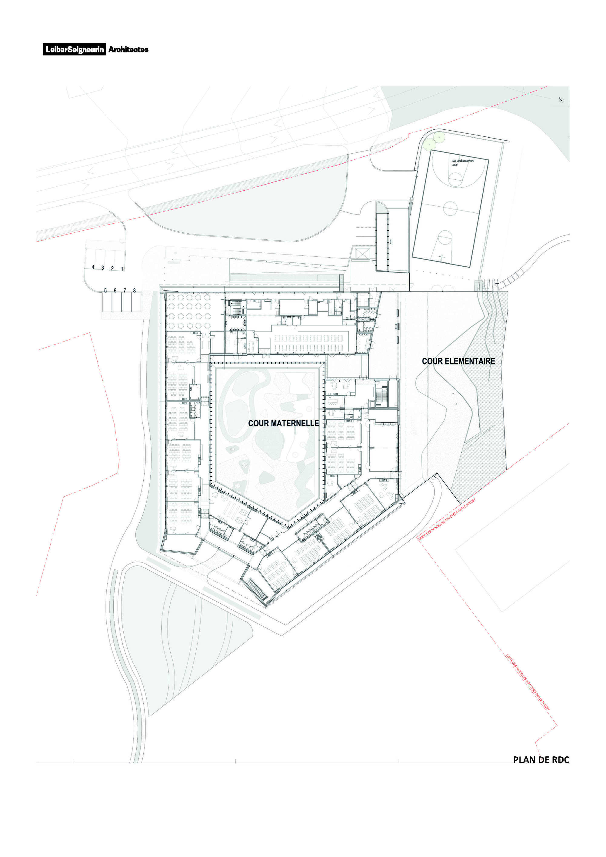 Ground floor plan drawing showing classroom wings arranged around two courtyards and a sports field