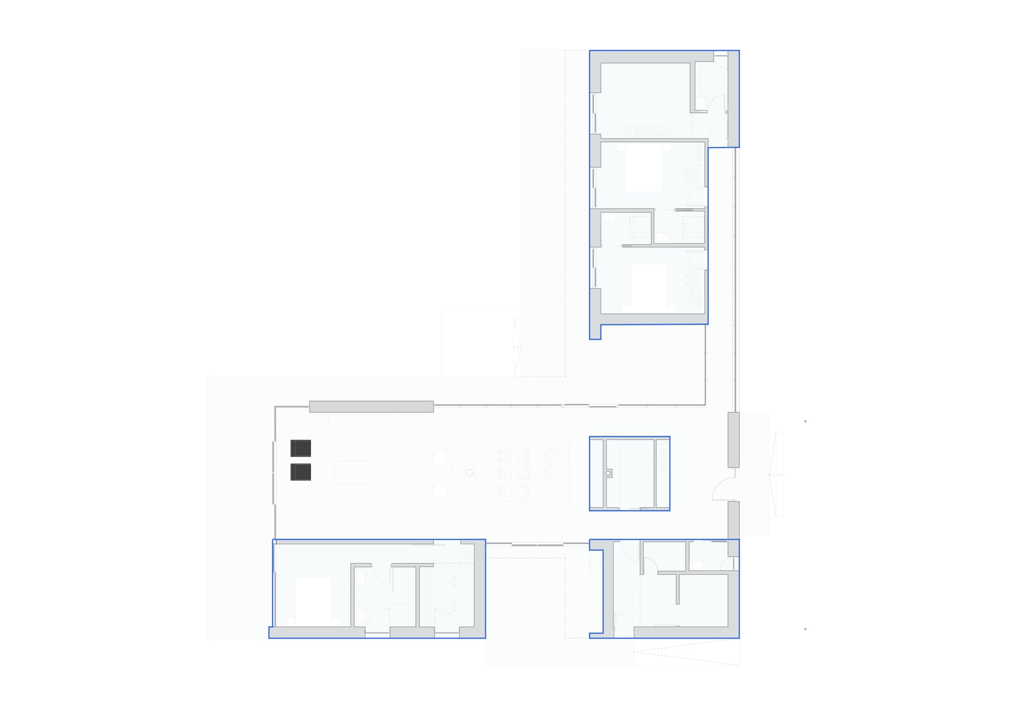 Floor plan drawing showing an L-shaped residence with clustered service rooms in one wing and open living space