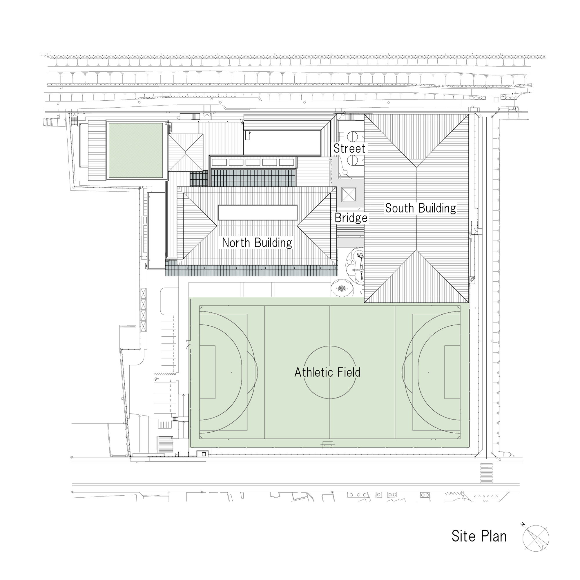 Site plan drawing showing two buildings flanking an athletic field and connected by a bridge