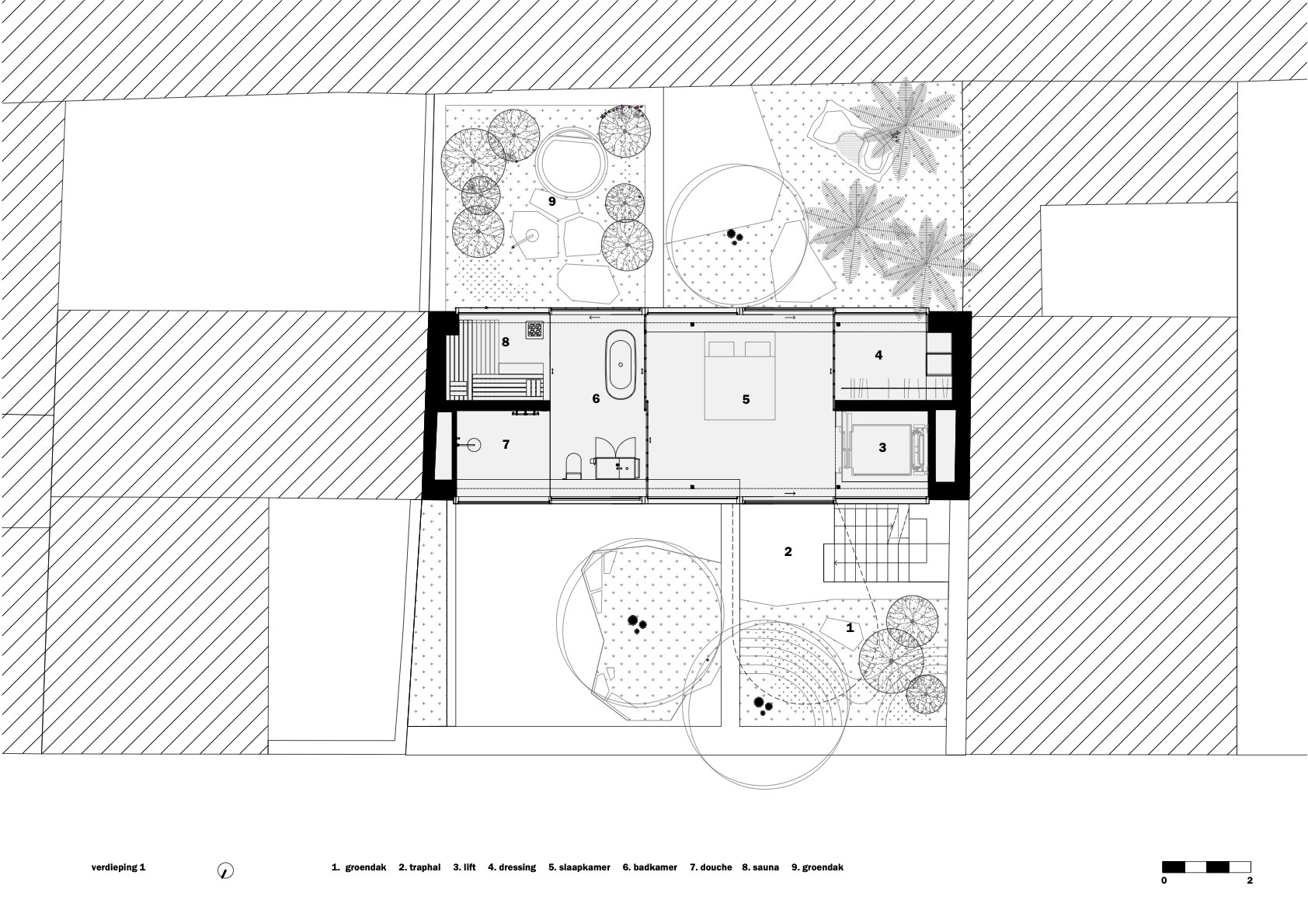 Floor plan drawing showing interior rooms and two courtyard gardens with circular paving patterns and trees