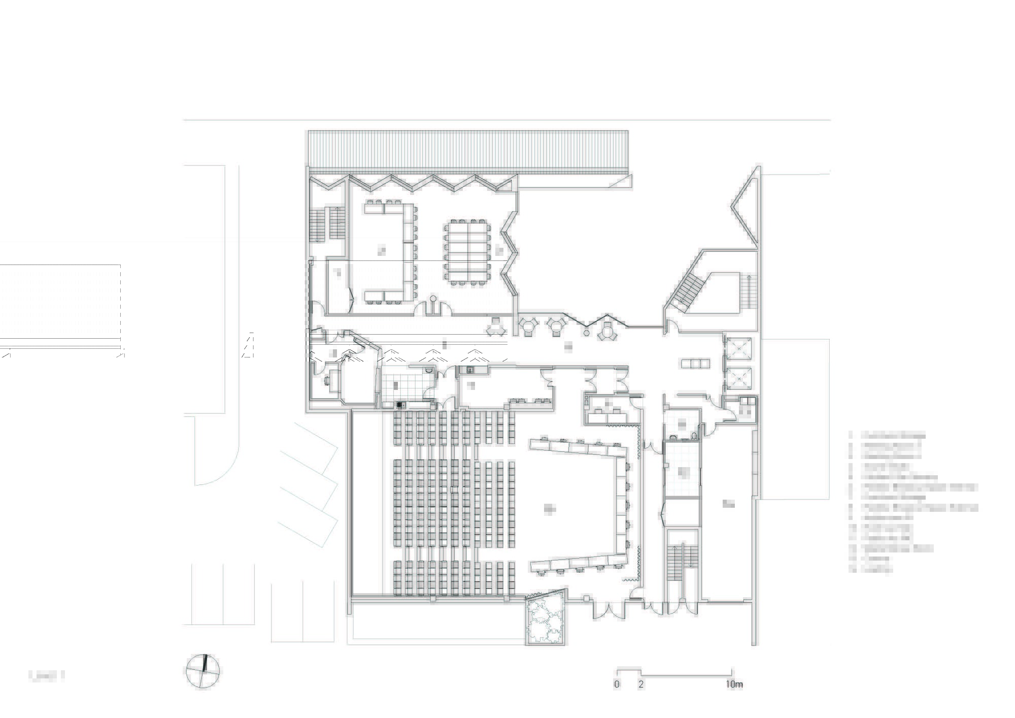 Floor plan drawing showing a large assembly hall with seating rows and adjacent meeting rooms