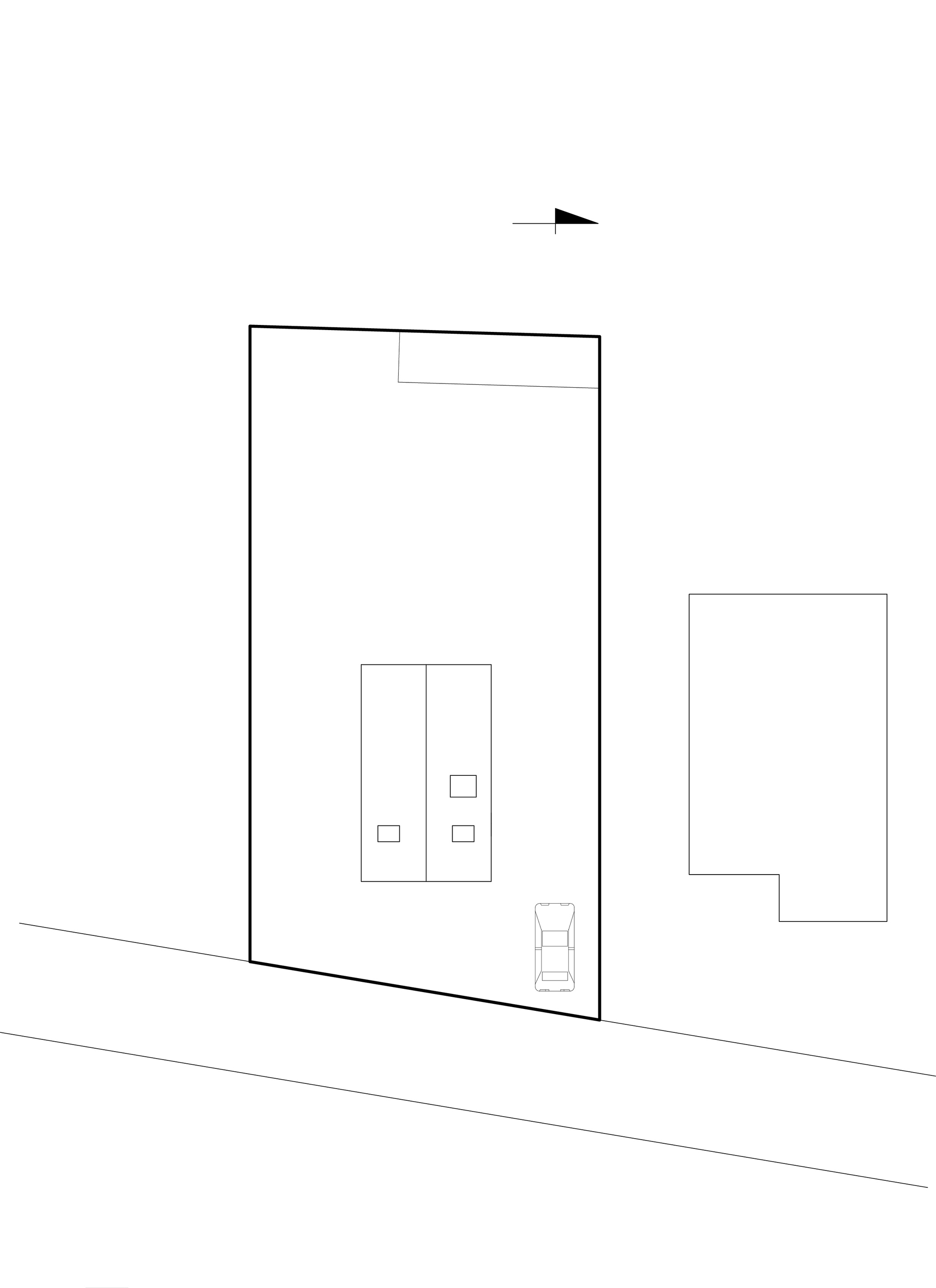 Site plan drawing showing building footprints and adjacent structures with orientation arrow