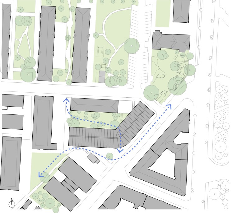 Site plan drawing showing an angled roofline with surrounding buildings, landscaped areas, and pedestrian circulation paths marked in blue
