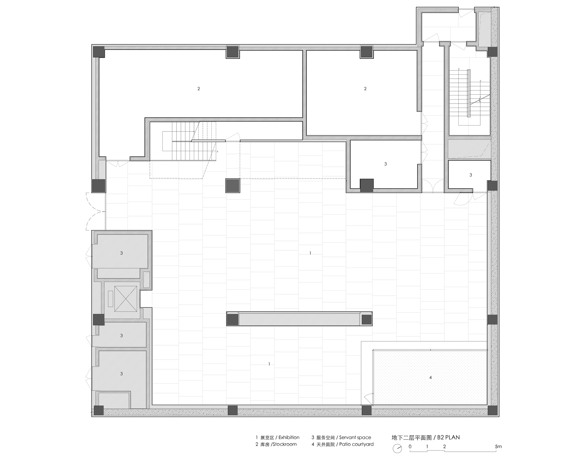 Second floor plan drawing showing exhibition rooms, service spaces, and a central open void