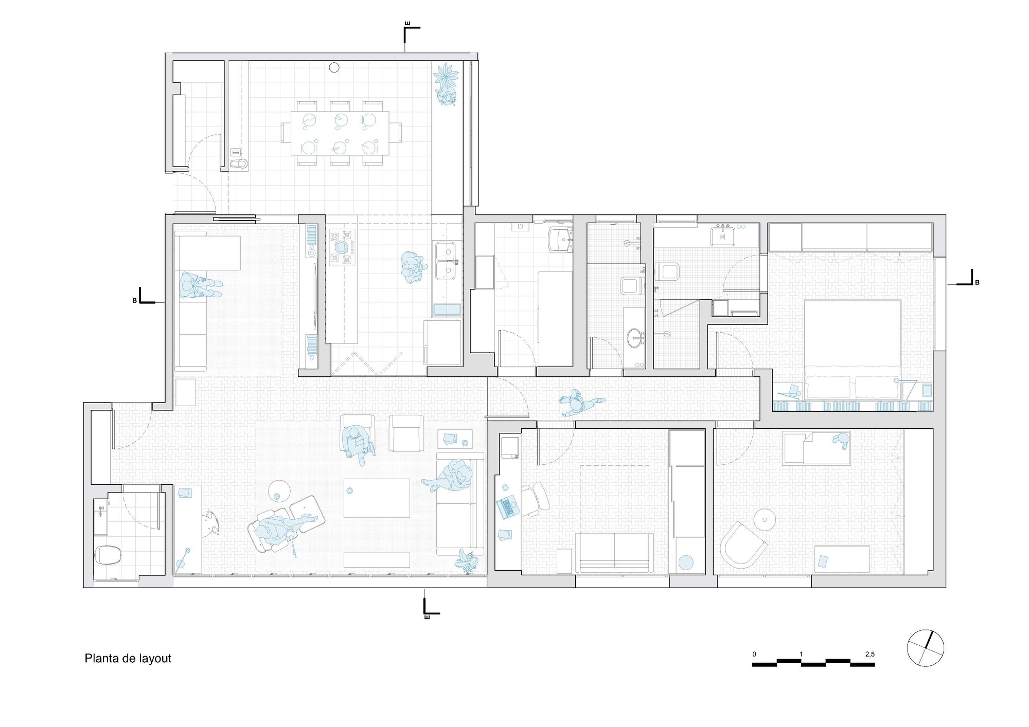 Floor plan drawing showing an L-shaped apartment layout with open living spaces and multiple bedrooms