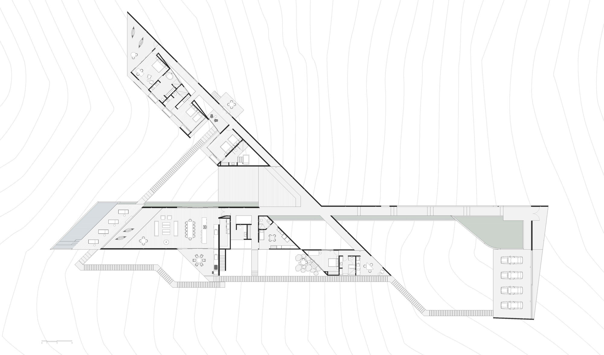 Floor plan drawing showing two angular wings intersecting at a central core with topographic contours