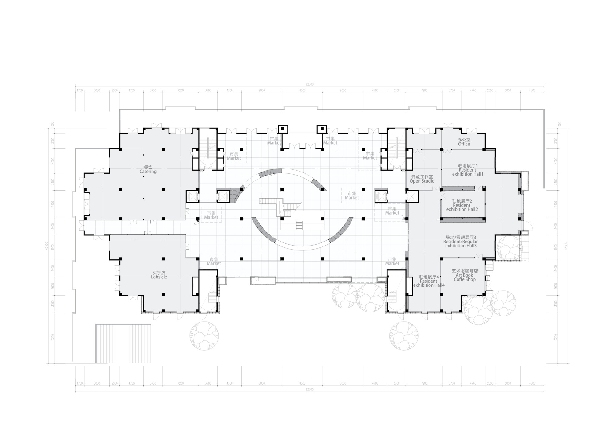 Floor plan drawing showing two curved staircases flanking a central space with perimeter rooms