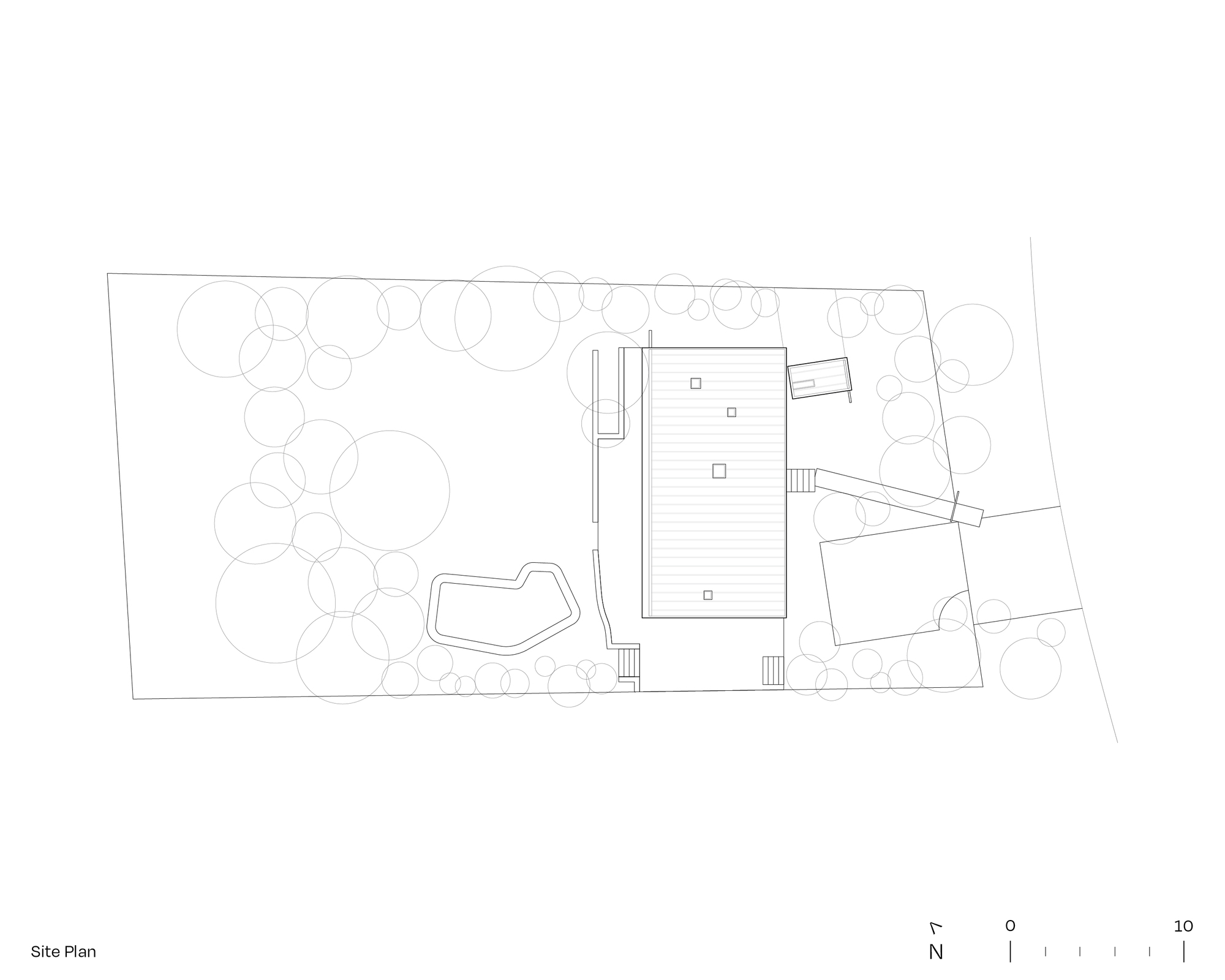 Site plan drawing showing a rectangular building with pool, deck, and landscaping with circular tree canopies