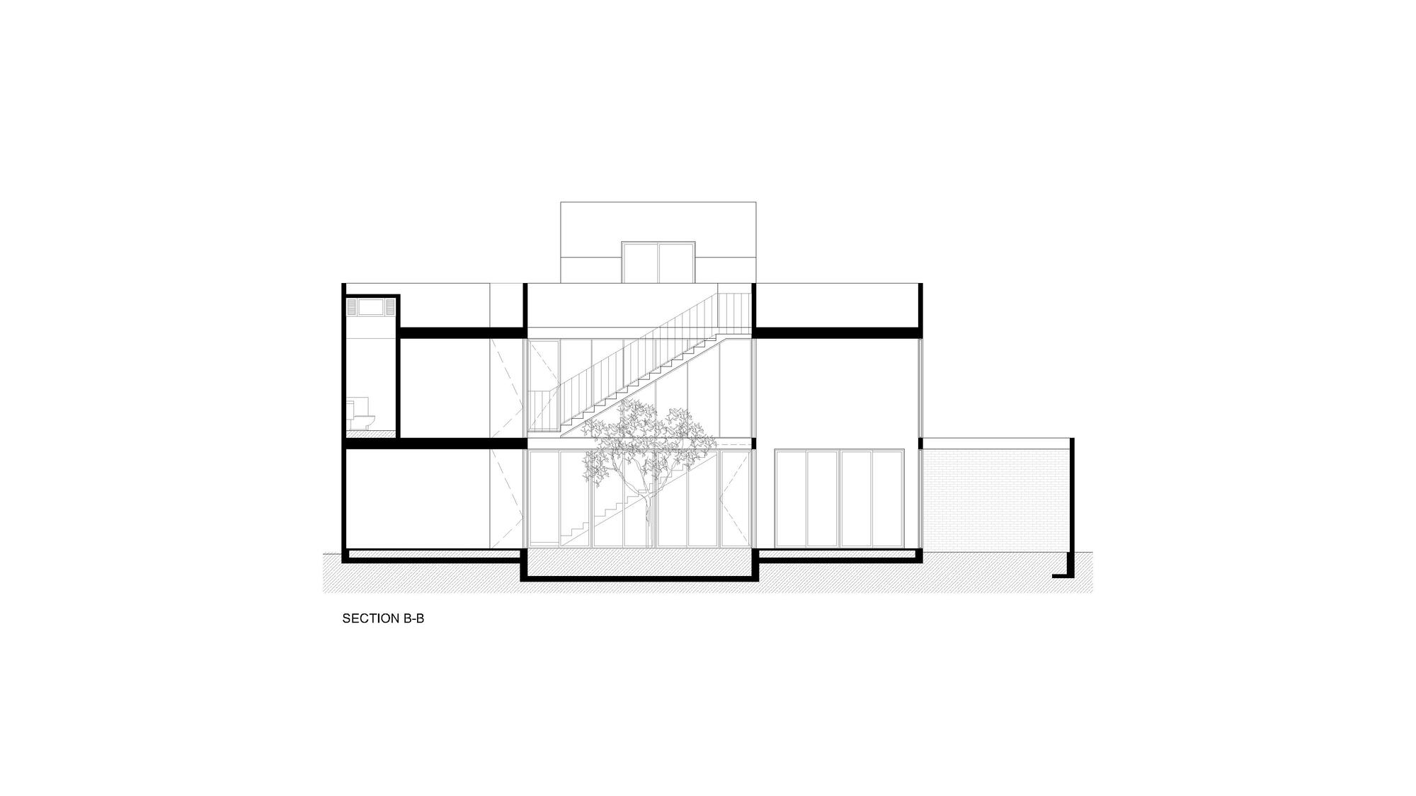 Section drawing showing split-level interior volumes with a central staircase and planted courtyard