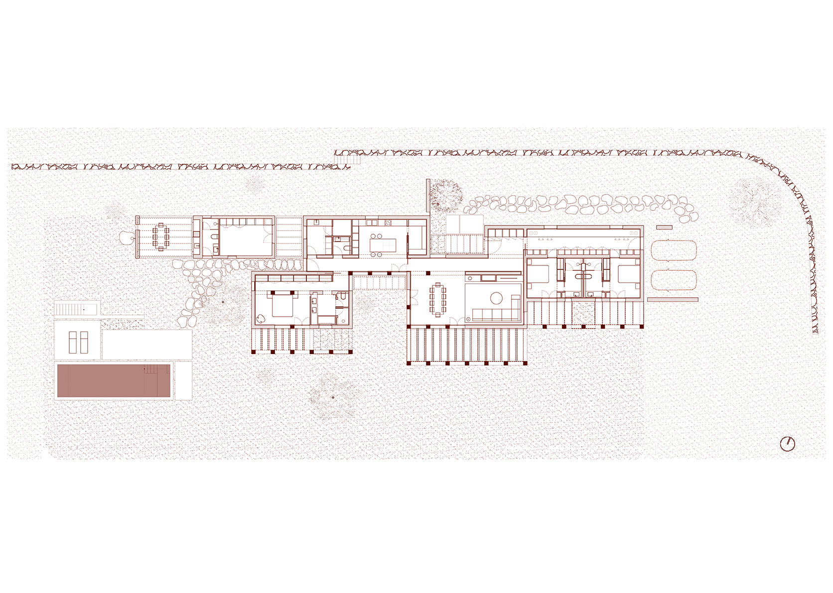 Floor plan drawing showing an elongated residence with courtyards and a row of trees along the curved site boundary