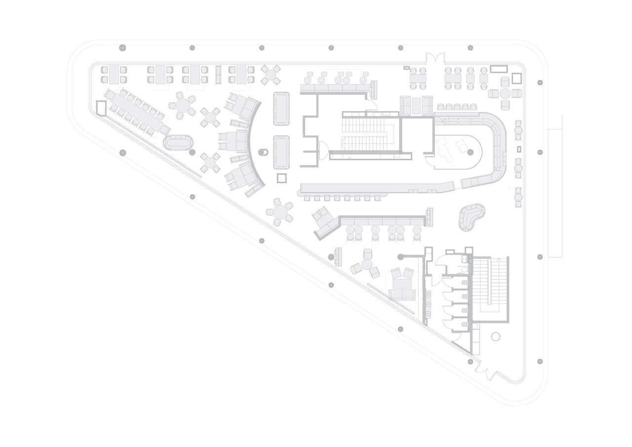 Floor plan drawing showing triangular layout with dining areas and central service core