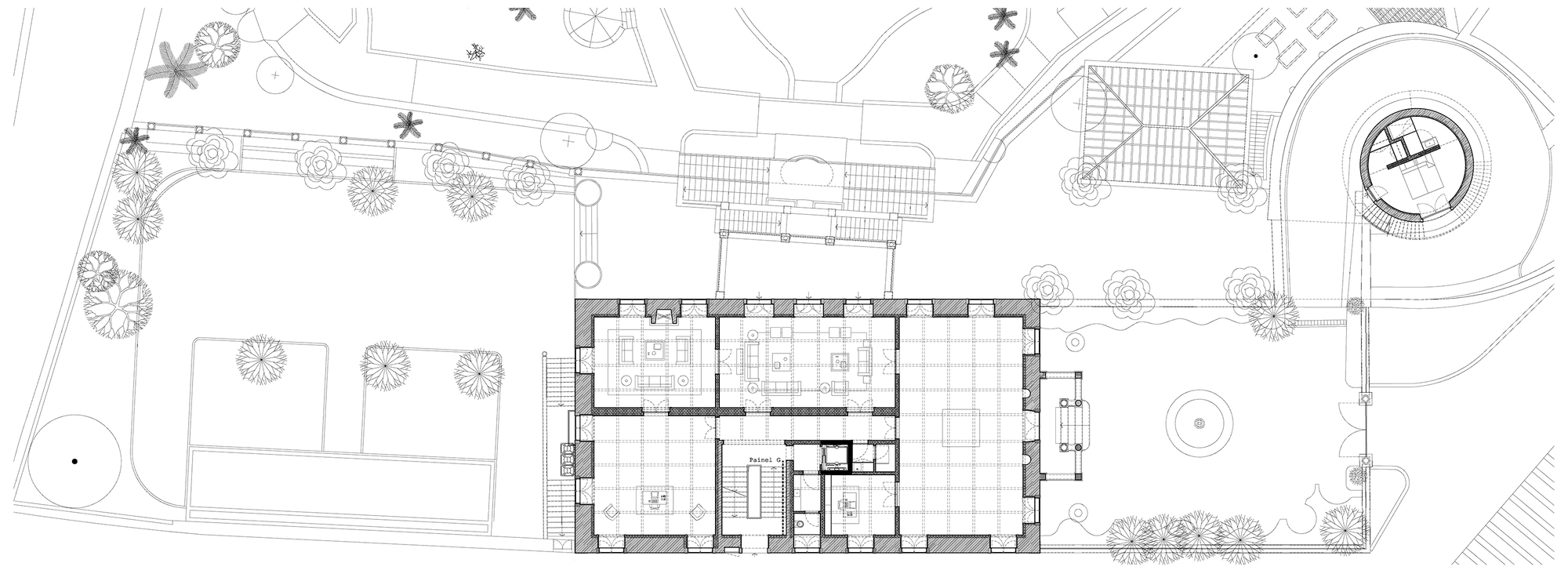 Ground floor plan drawing showing interior room layouts and surrounding landscaped grounds