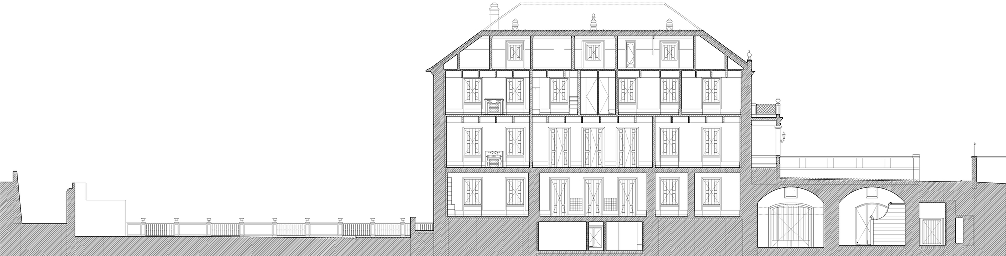 Section drawing cutting through a multi-storey building with timber framing and arched base
