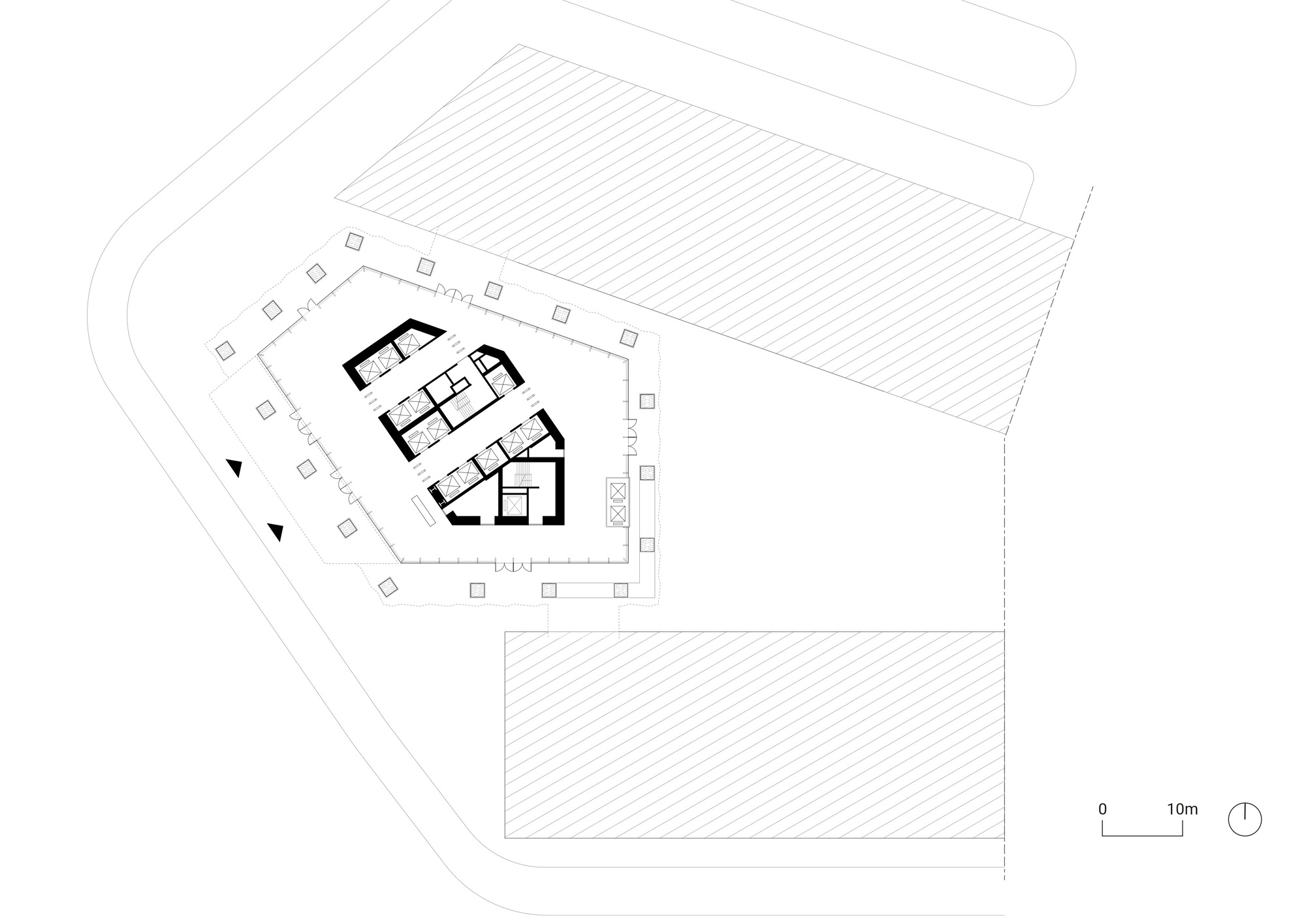 Ground floor plan of an angular tower podium surrounded by columns and adjacent structures