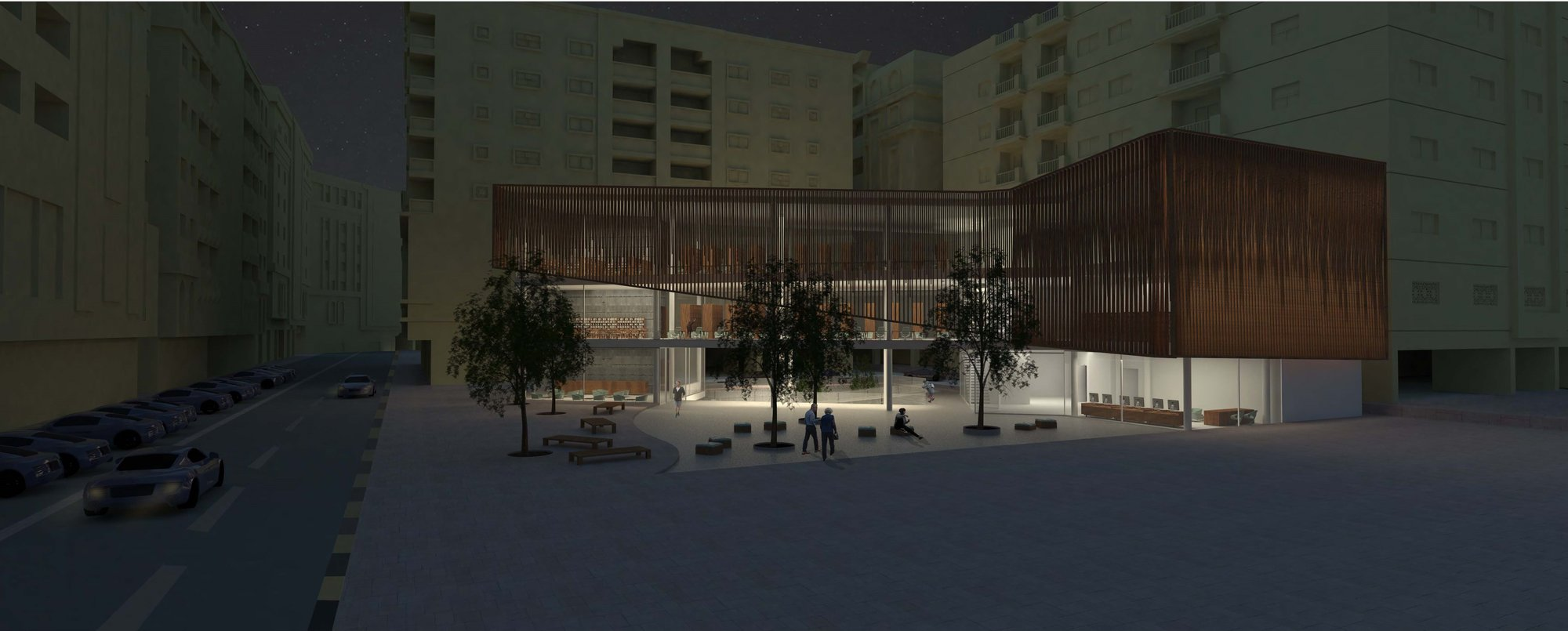 Night view highlighting the facade’s permeability and the library’s role as an active civic landmark