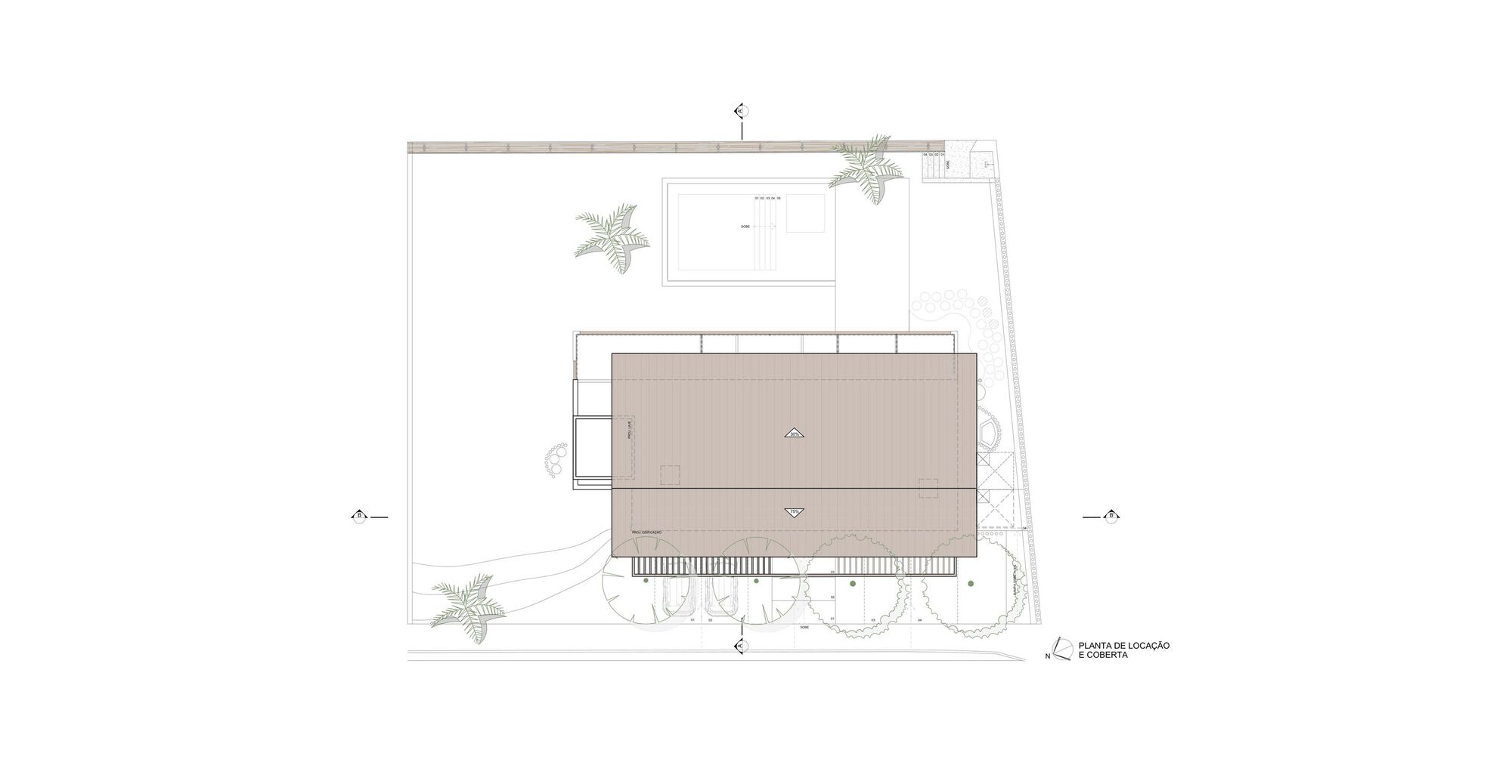 Site plan drawing showing a rectangular building volume surrounded by landscaping and pool