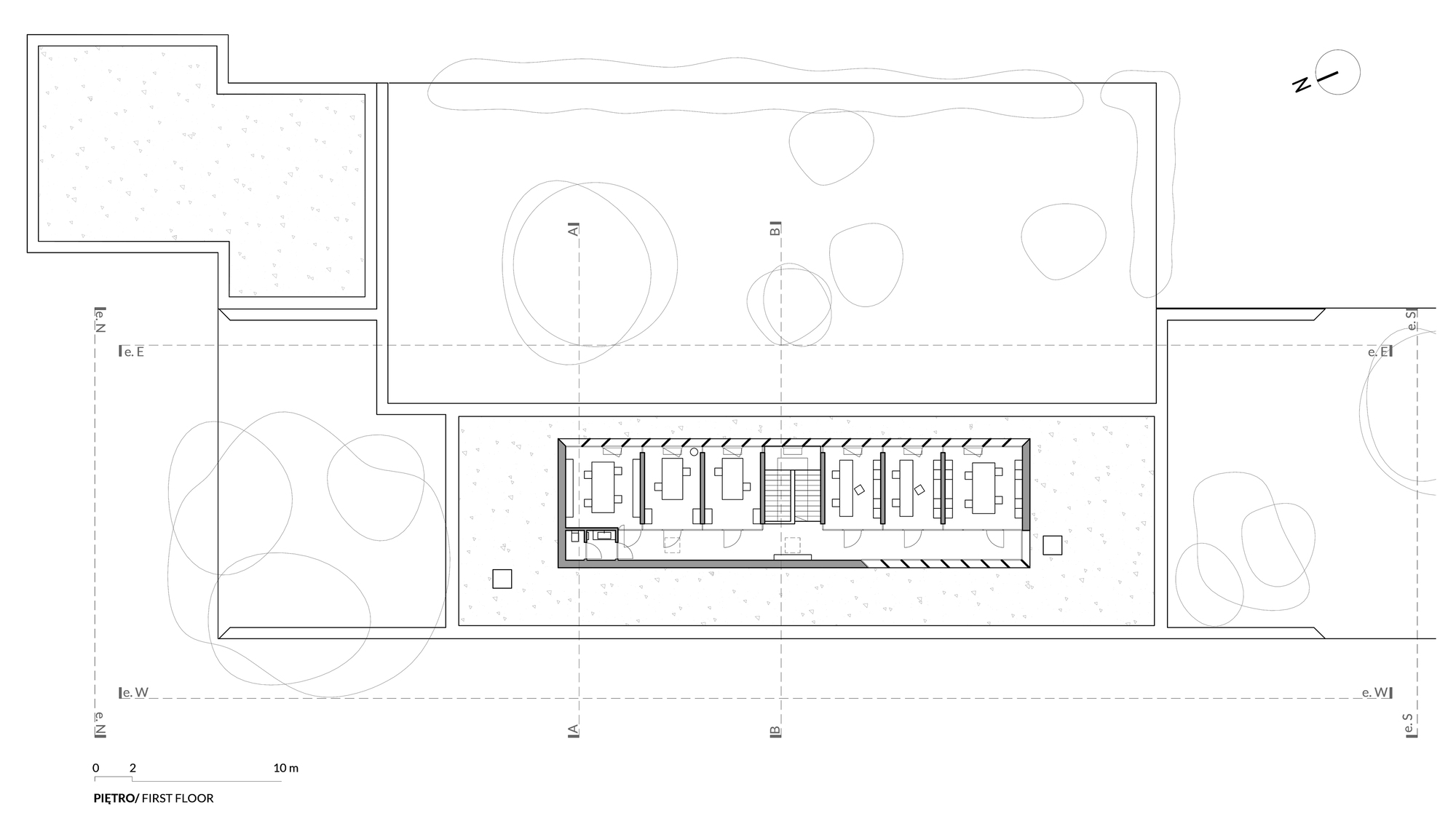 First floor plan drawing showing elongated rectangular footprint with central circulation and surrounding landscape