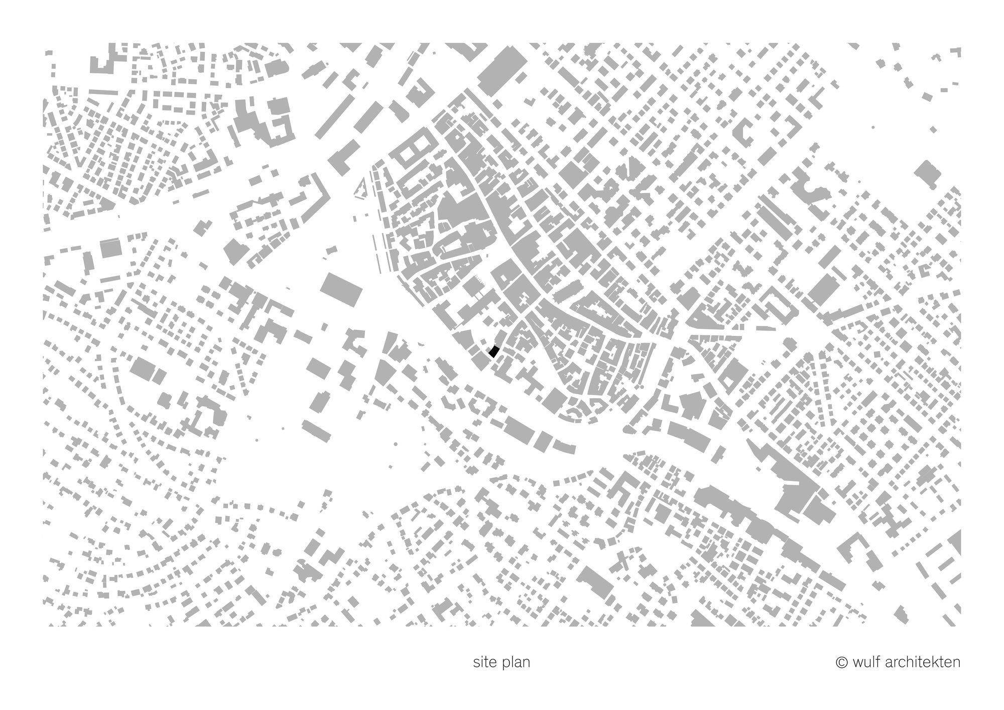 Site plan drawing showing the building footprint within the surrounding urban fabric