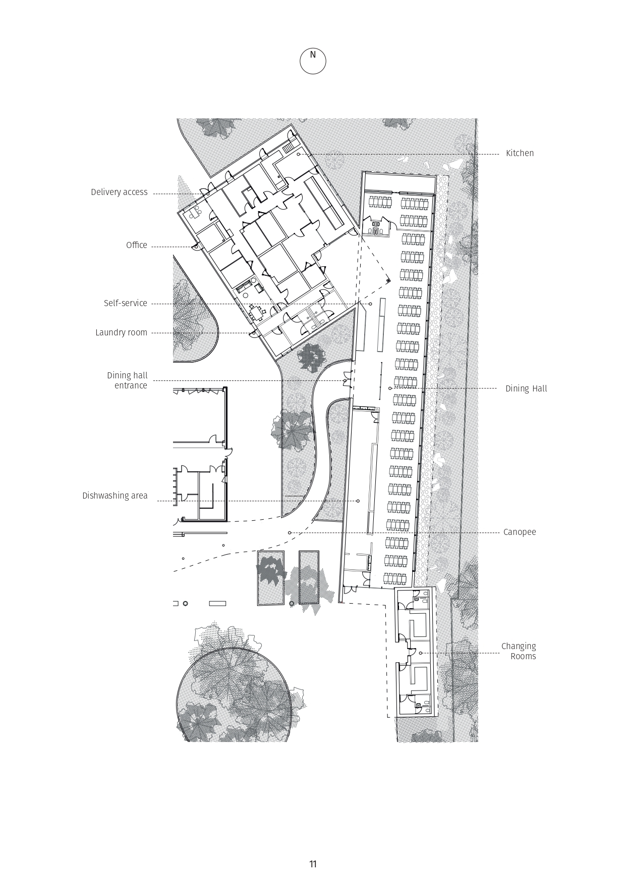 Site plan drawing showing a main building with labeled service areas alongside a long canopied parking structure