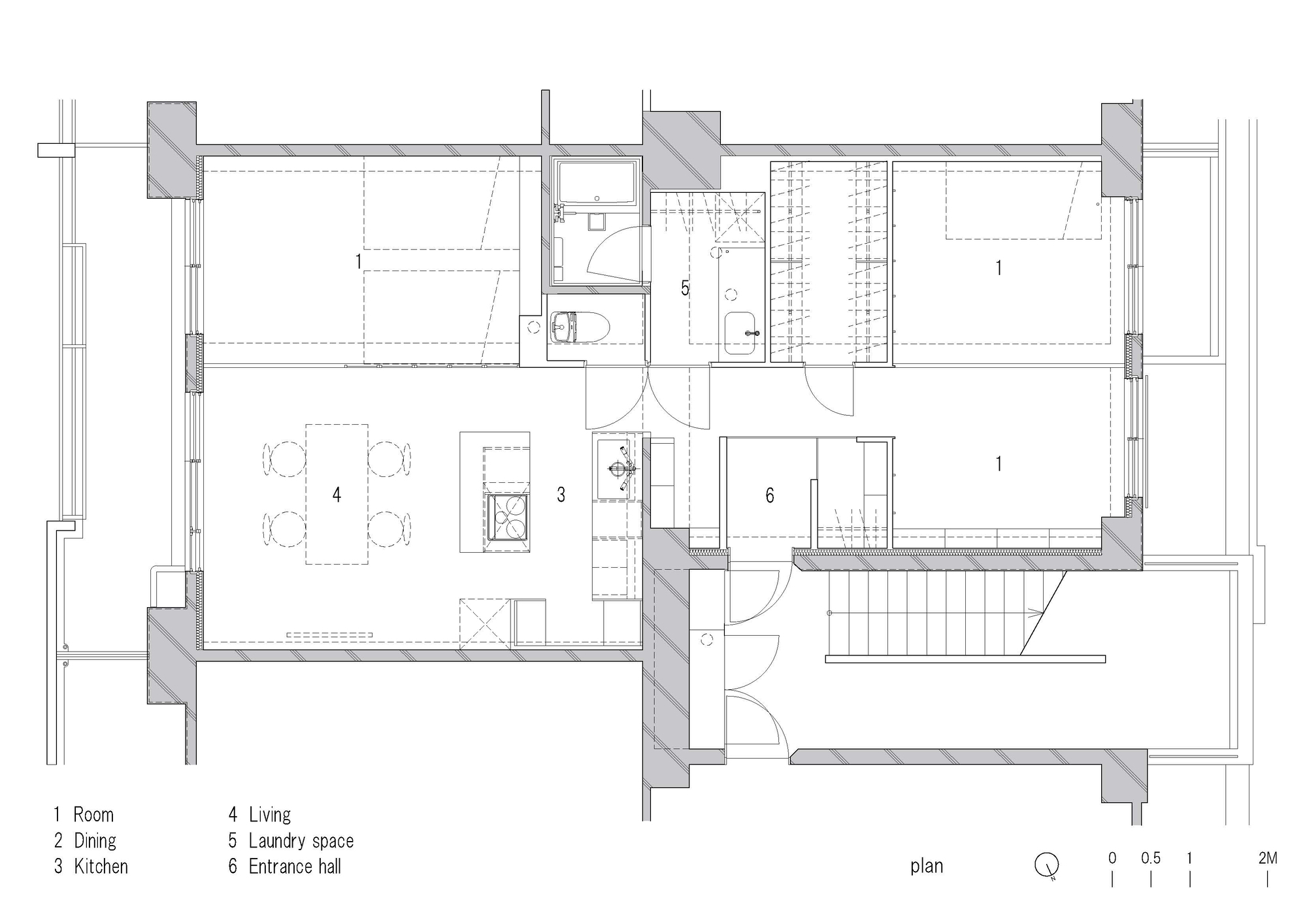 Floor plan drawing showing a compact apartment layout with living areas, kitchen, bathroom and two sleeping rooms