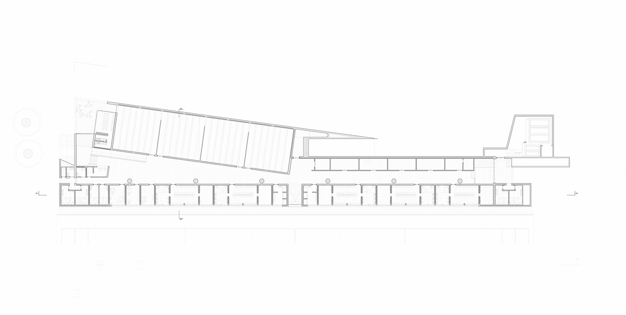Floor plan drawing depicting a linear arrangement of rooms with angled volumes at each end