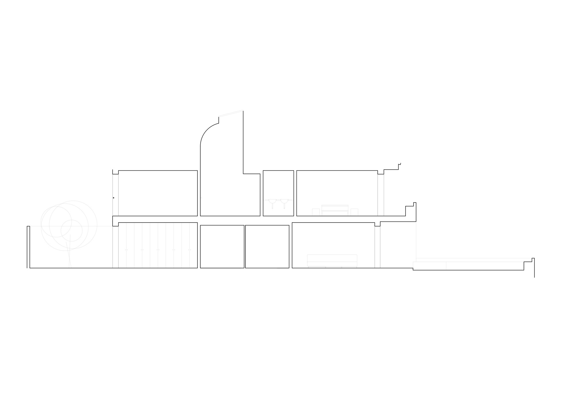 Section drawing showing two-level volume with split-level floors and circulation spaces