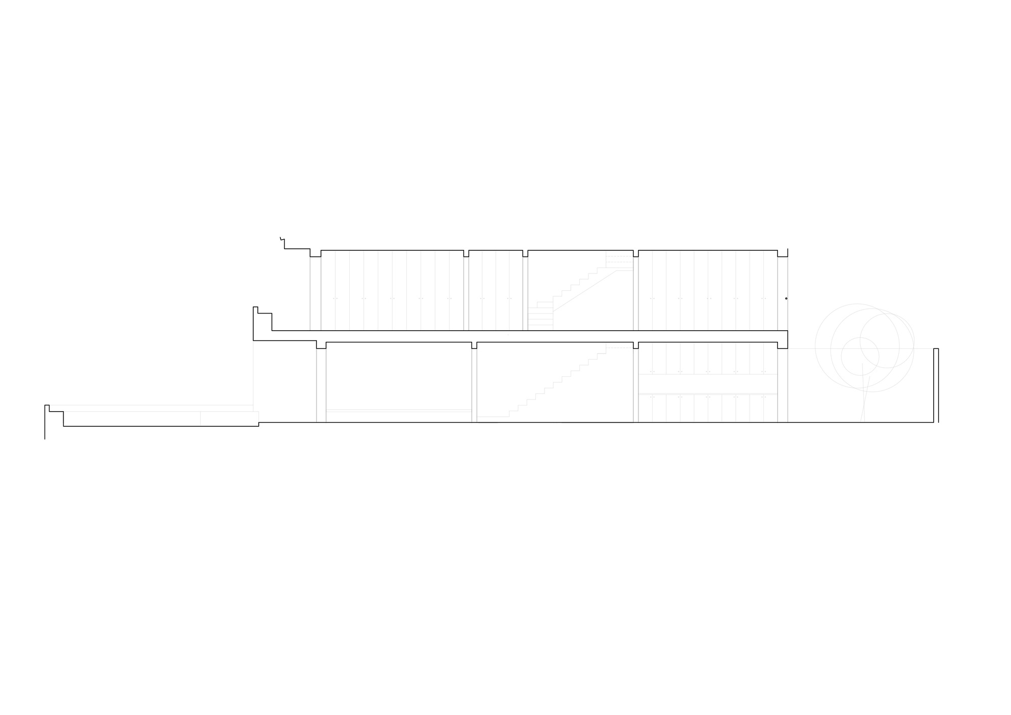 Section drawing showing a long horizontal volume with stepped roof levels and regular column spacing