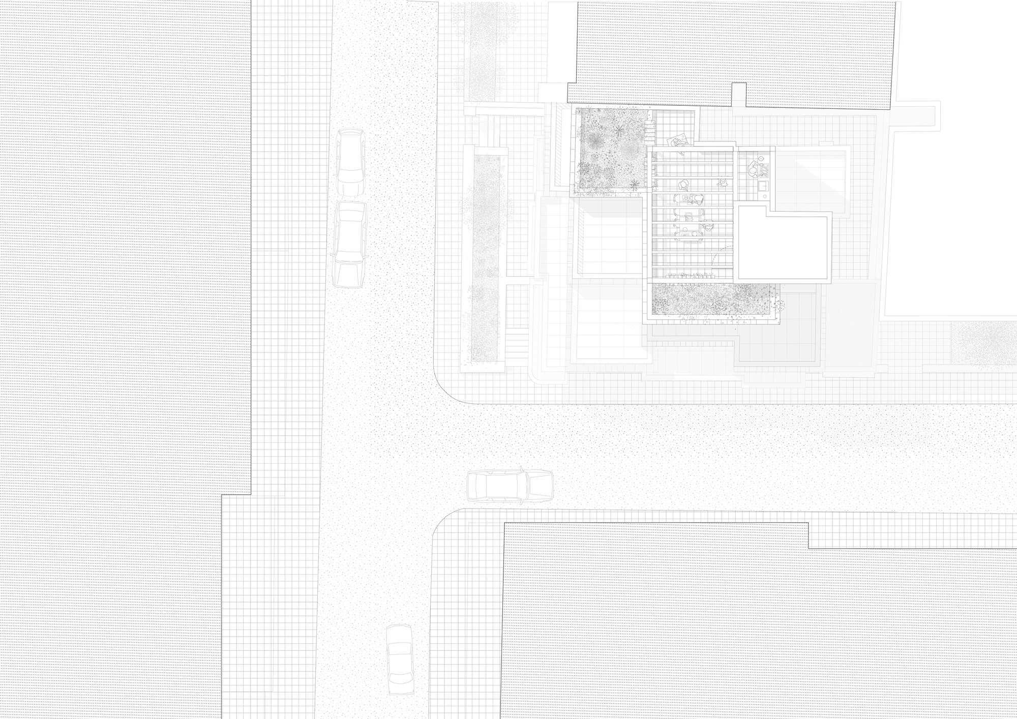 Site plan drawing depicting the building footprint with planted terraces at the street corner