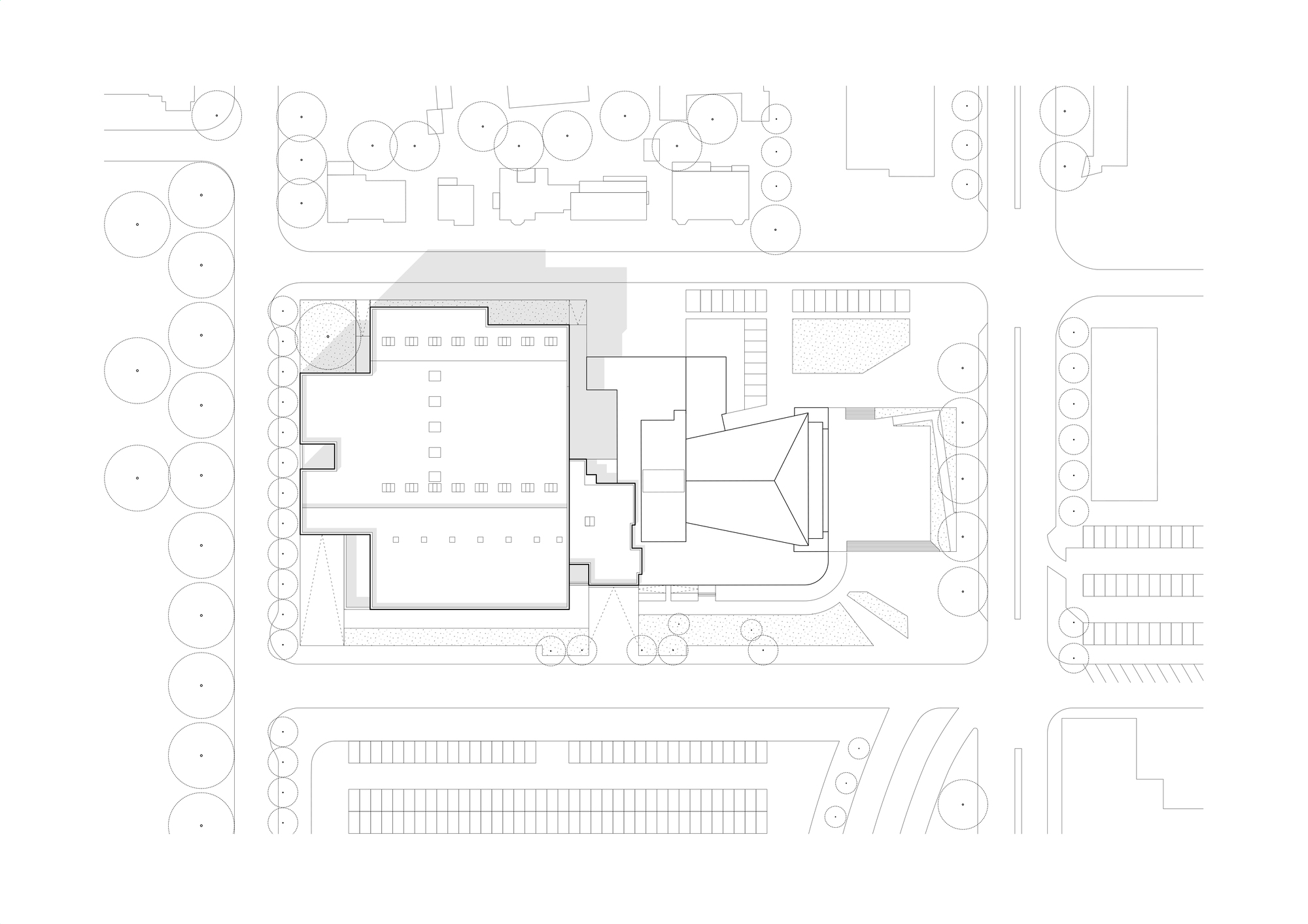 Ground floor site plan drawing showing building footprint with surrounding trees and parking areas