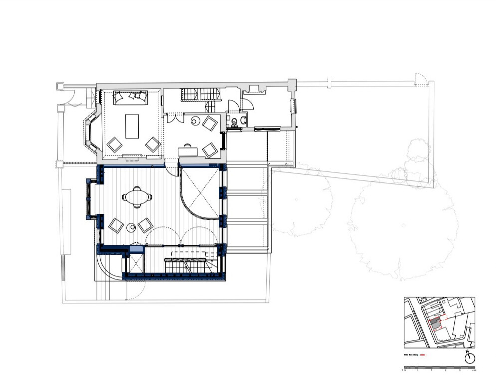 Floor plan drawing showing living and dining spaces with thick perimeter walls and outdoor terrace