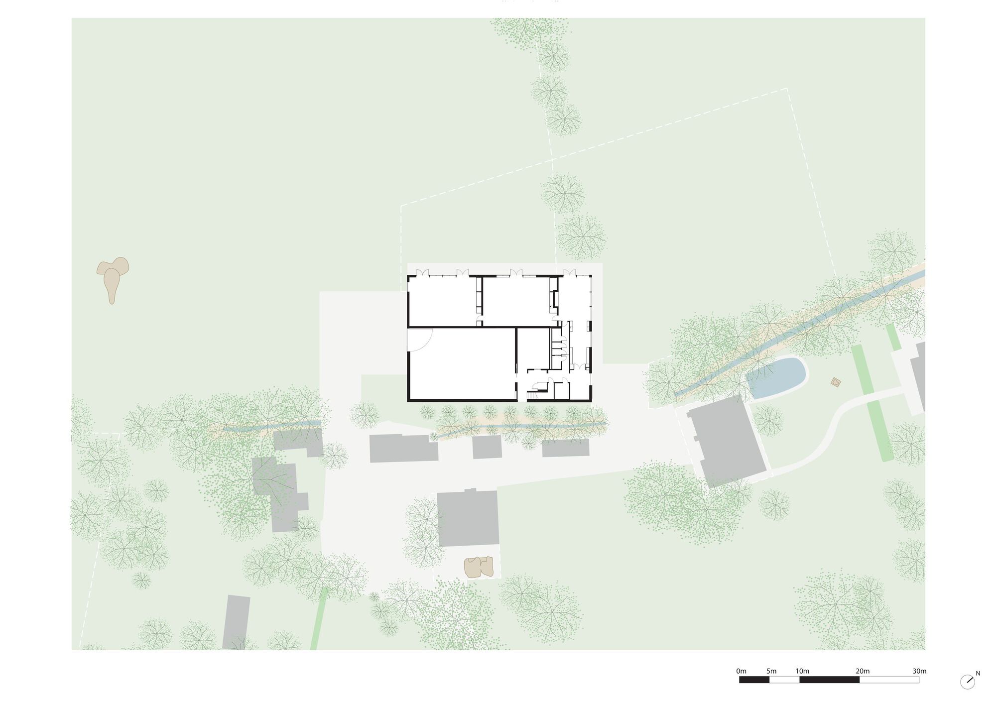 Floor plan drawing depicting rectangular volumes with surrounding landscape and neighboring structures