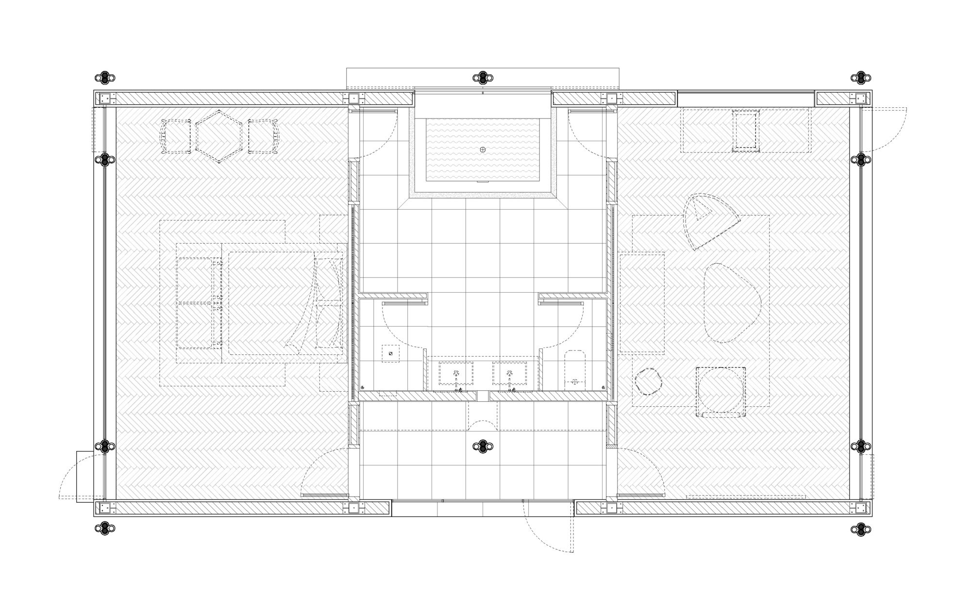 Floor plan drawing showing two open rooms flanking a central bathroom and kitchen zone