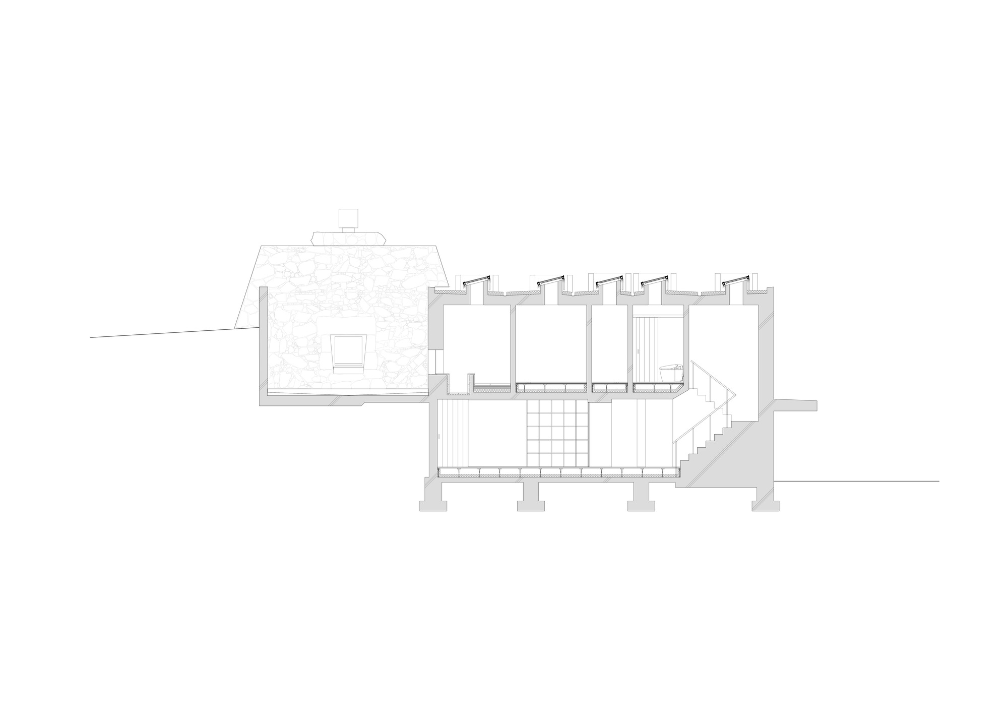 Transverse section drawing showing row of rooms with clerestory windows and exterior stair